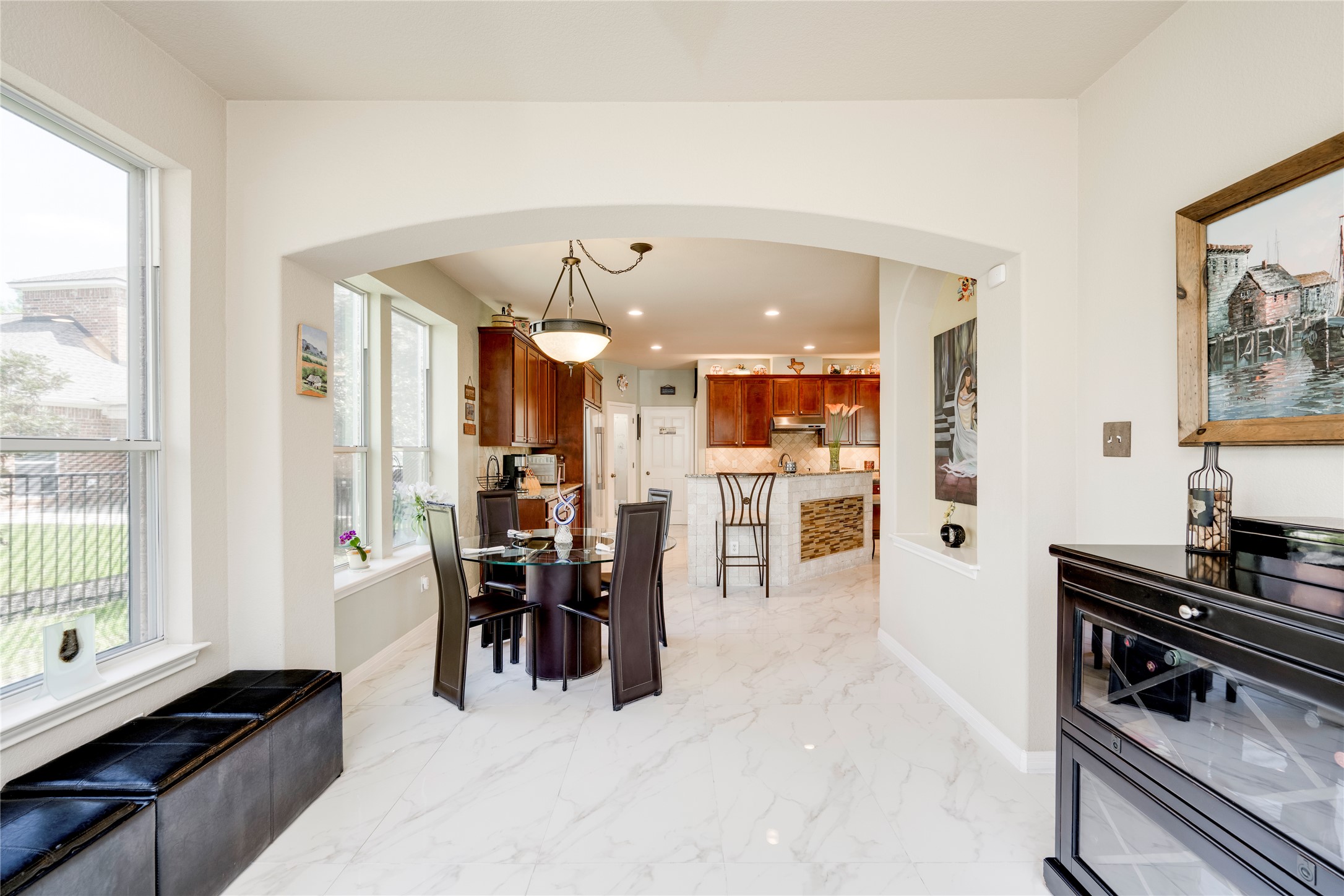 11332 Terrace Meadow Way Manor, TX 78653 - Photo 12 of 37 a view of a kitchen and dining room
