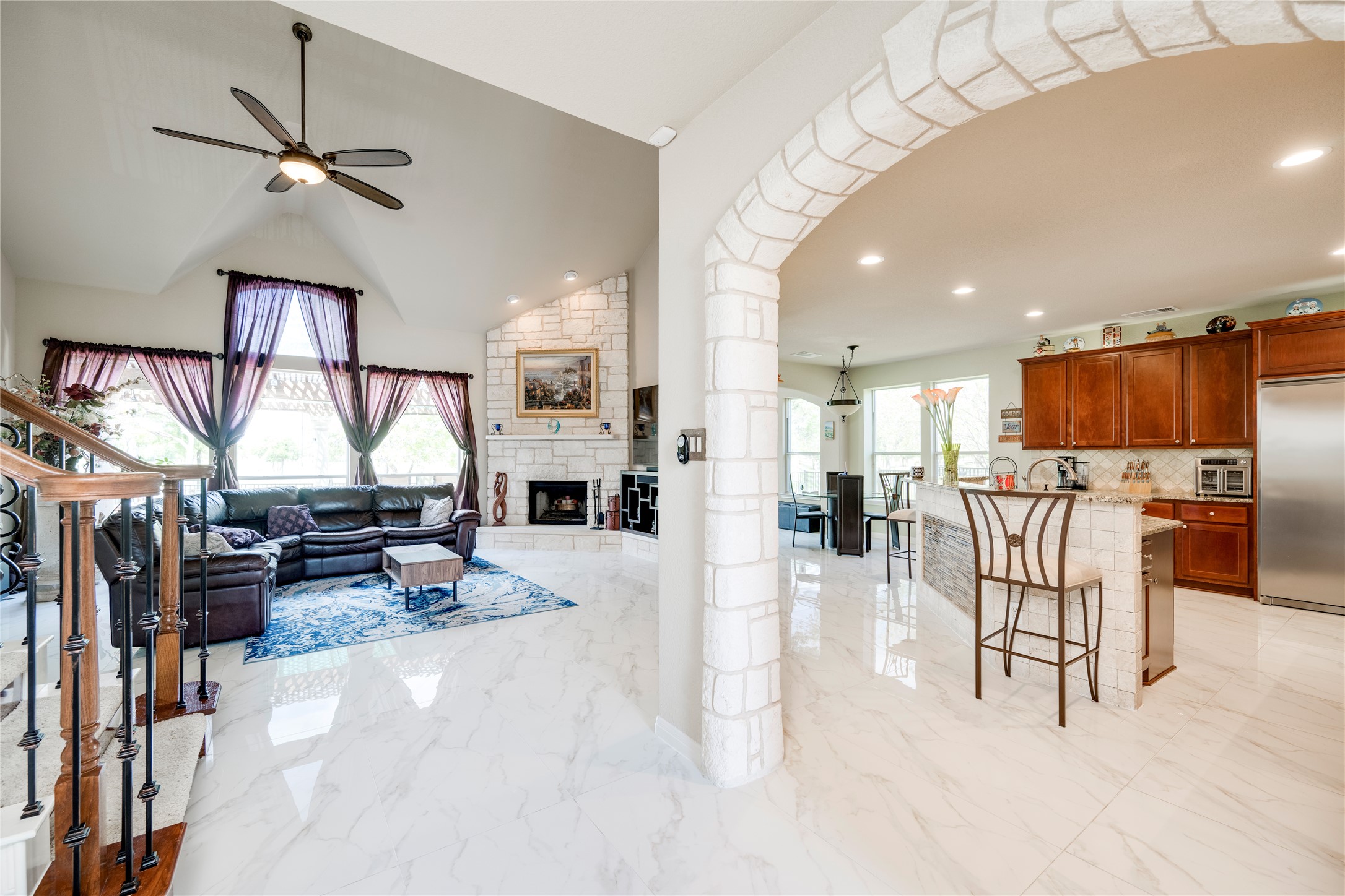 11332 Terrace Meadow Way Manor, TX 78653 - Photo 2 of 37 a view of kitchen with stainless steel appliances kitchen island dining table and chairs