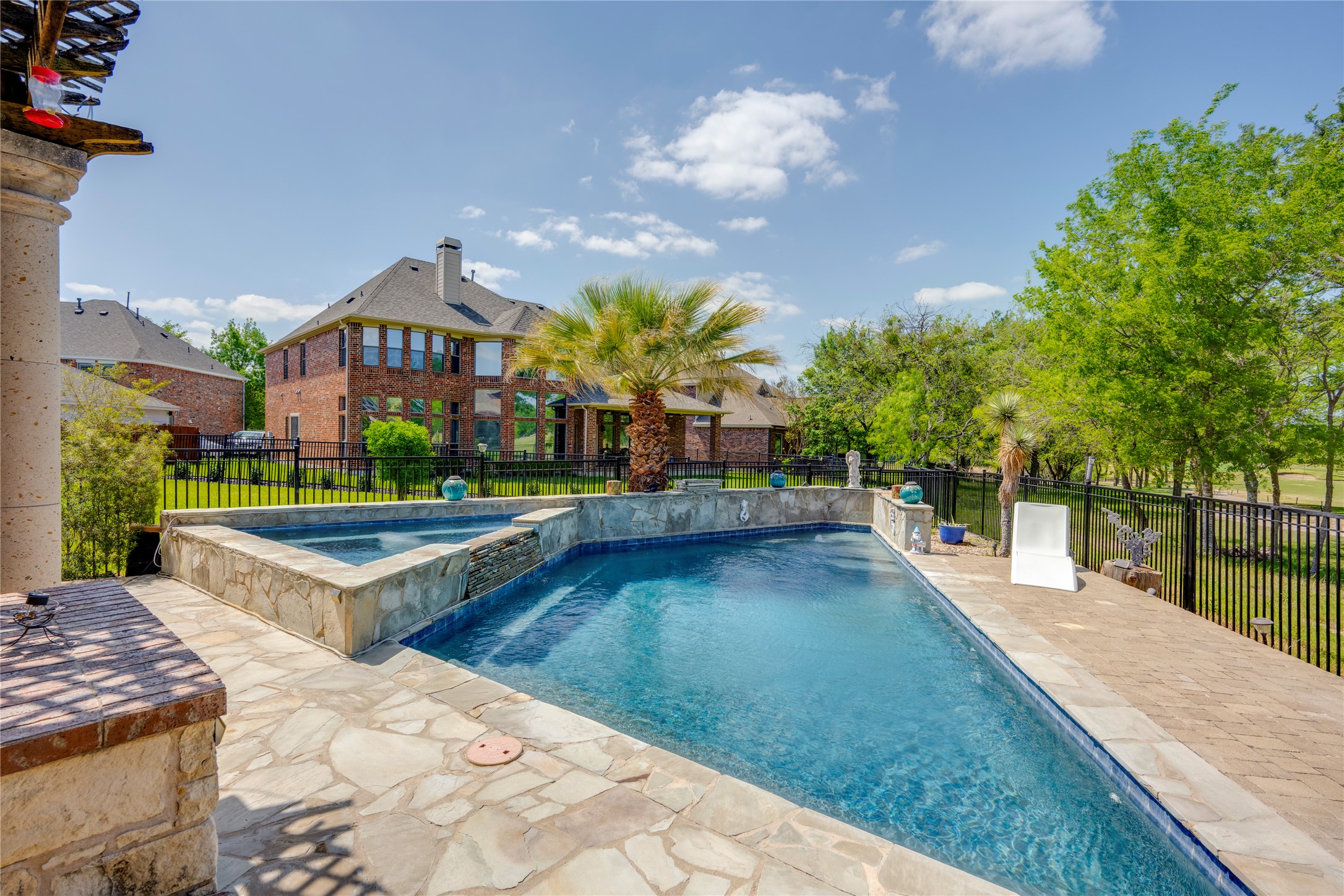 11332 Terrace Meadow Way Manor, TX 78653 - Photo 26 of 37 a view of a house with yard and swimming pool