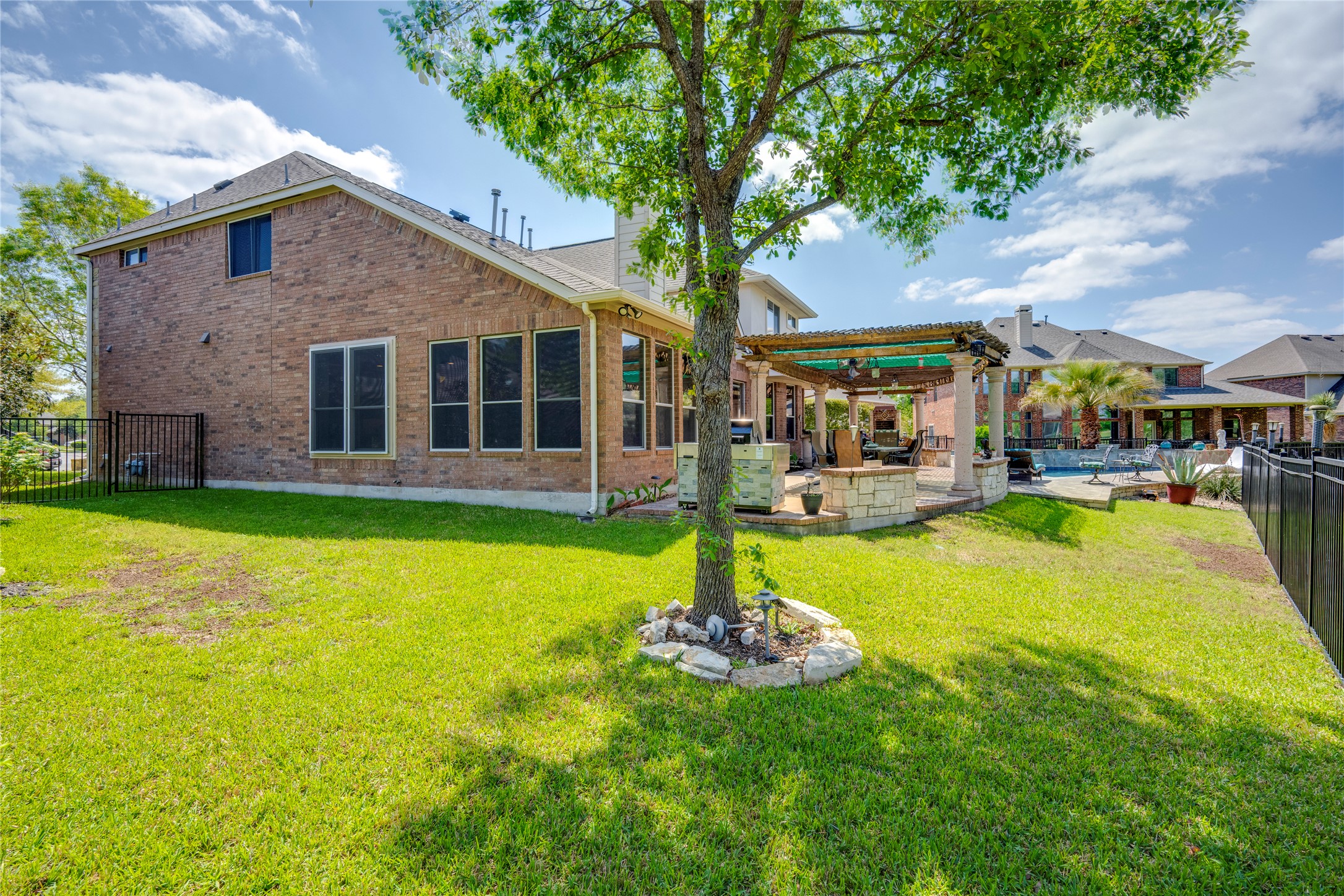 11332 Terrace Meadow Way Manor, TX 78653 - Photo 29 of 37 a front view of a house with garden