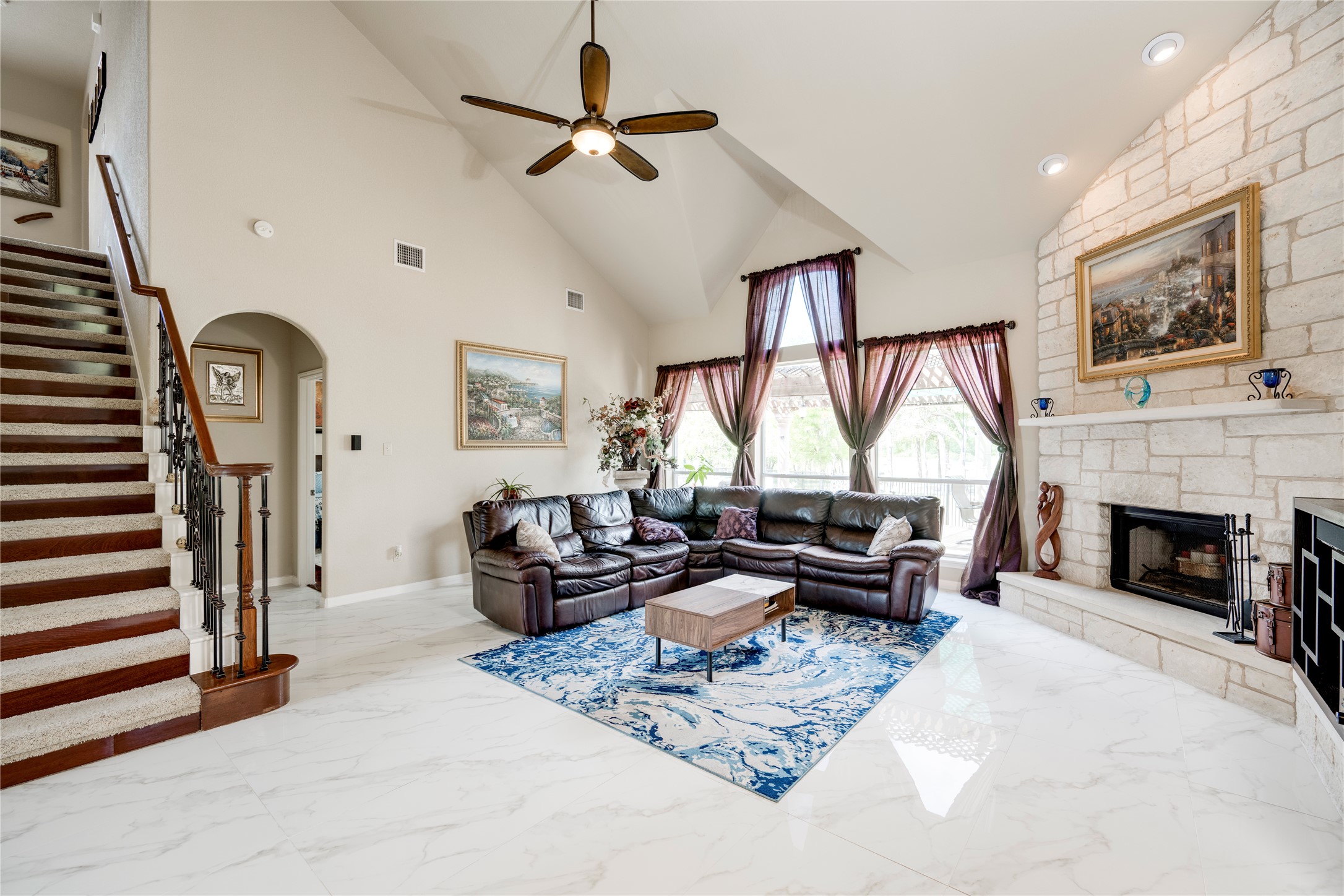 11332 Terrace Meadow Way Manor, TX 78653 - Photo 3 of 37 a living room with furniture a fireplace and a large window