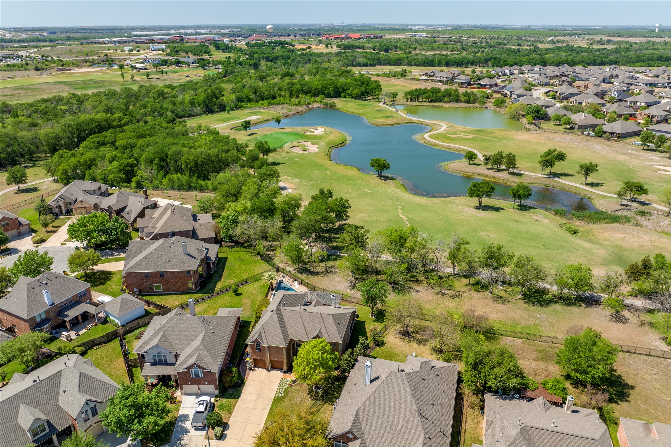 11332 Terrace Meadow Way Manor, TX 78653 - Photo 36 of 37 an aerial view of residential houses with outdoor space and river