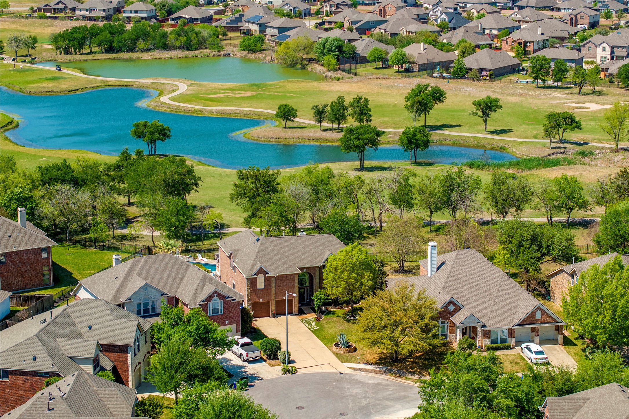 11332 Terrace Meadow Way Manor, TX 78653 - Photo 37 of 37 an aerial view of a house with a lake view