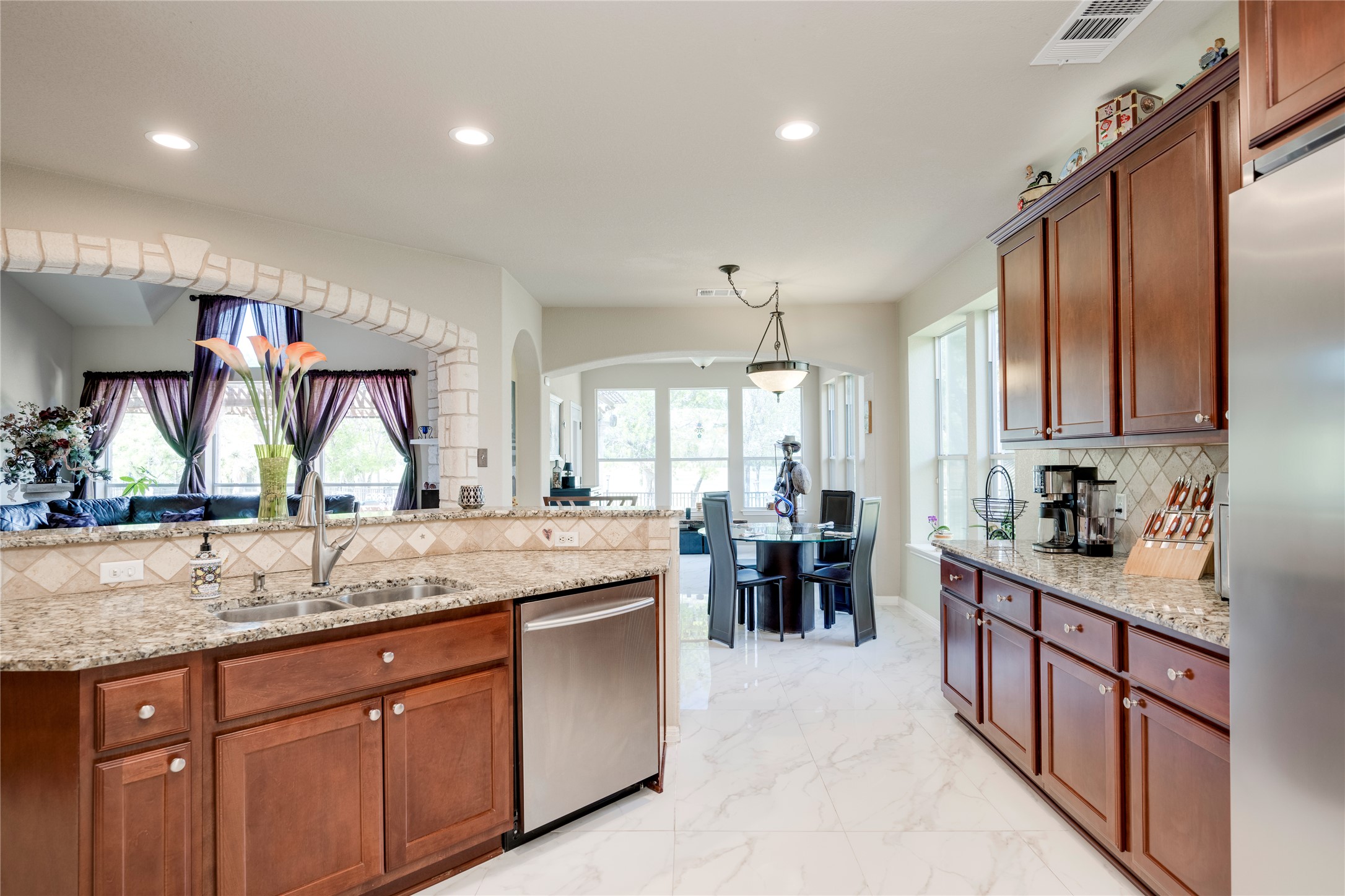 11332 Terrace Meadow Way Manor, TX 78653 - Photo 10 of 37 a kitchen with lots of counter space and window