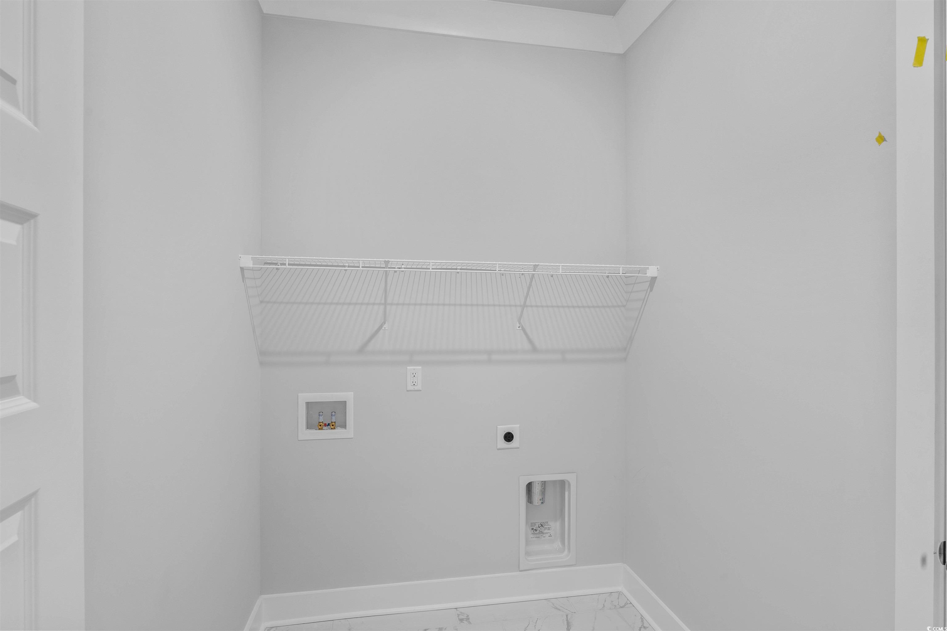 231 Atlantic Breeze Street Myrtle Beach, SC 29572 - Photo 17 of 21 Laundry room featuring marble finish floors, hookup for a washing machine, and electric dryer hookup