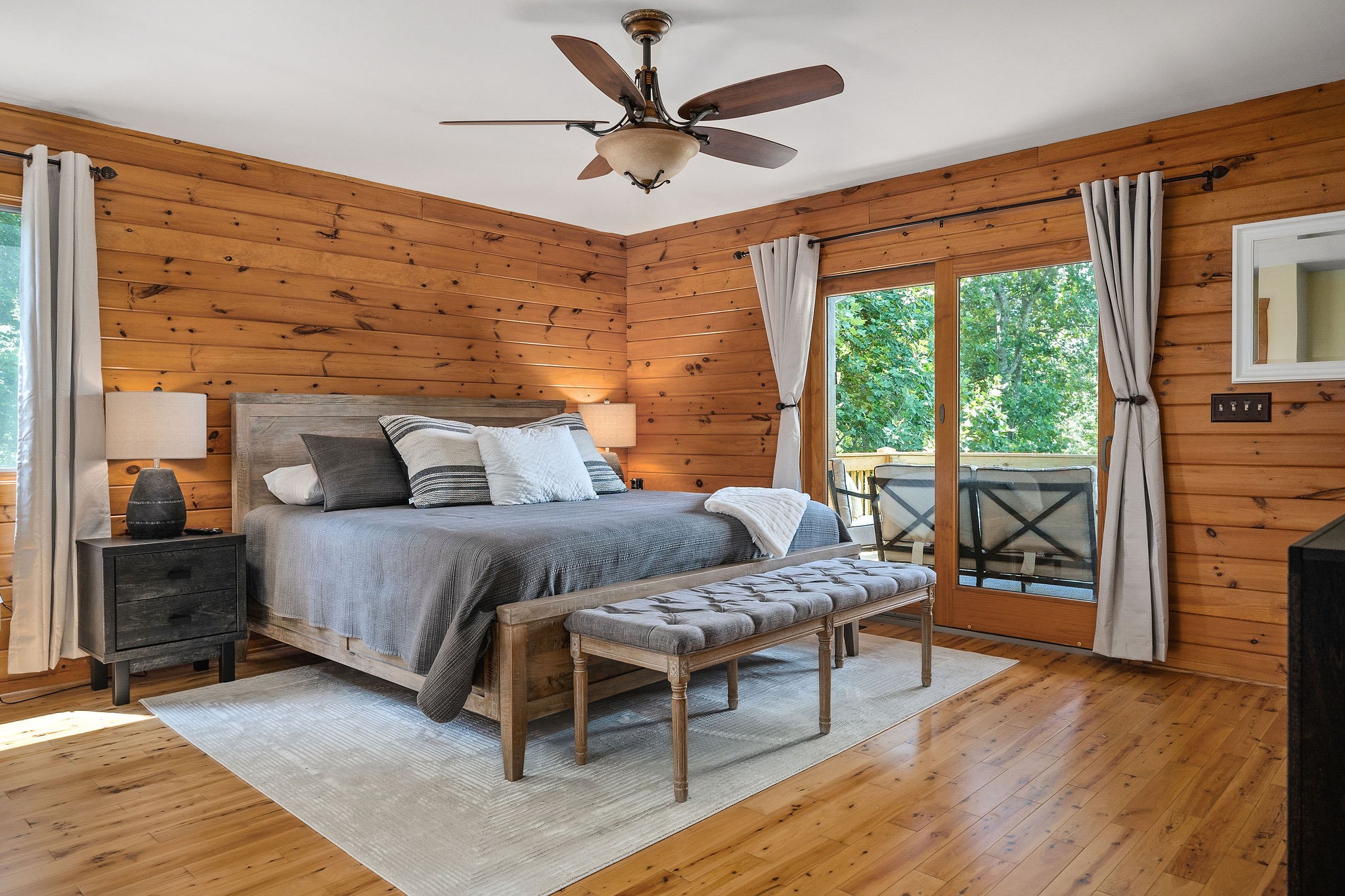 4415 Coconut Ridge Road Smithville, TN 37166 - Photo 22 of 52 a bedroom with a bed and wooden floor