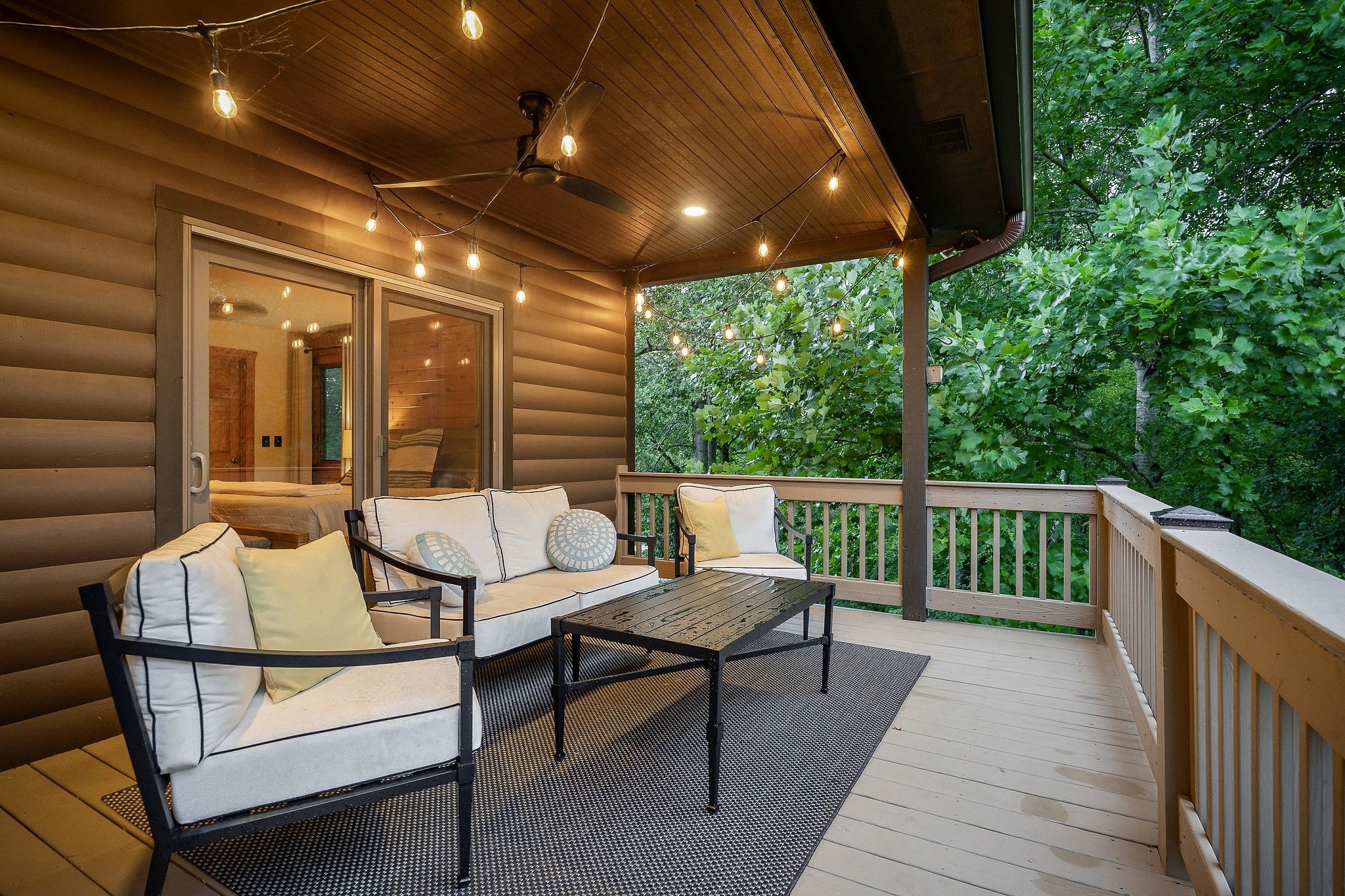 4415 Coconut Ridge Road Smithville, TN 37166 - Photo 23 of 52 a view of a patio with a table and chairs