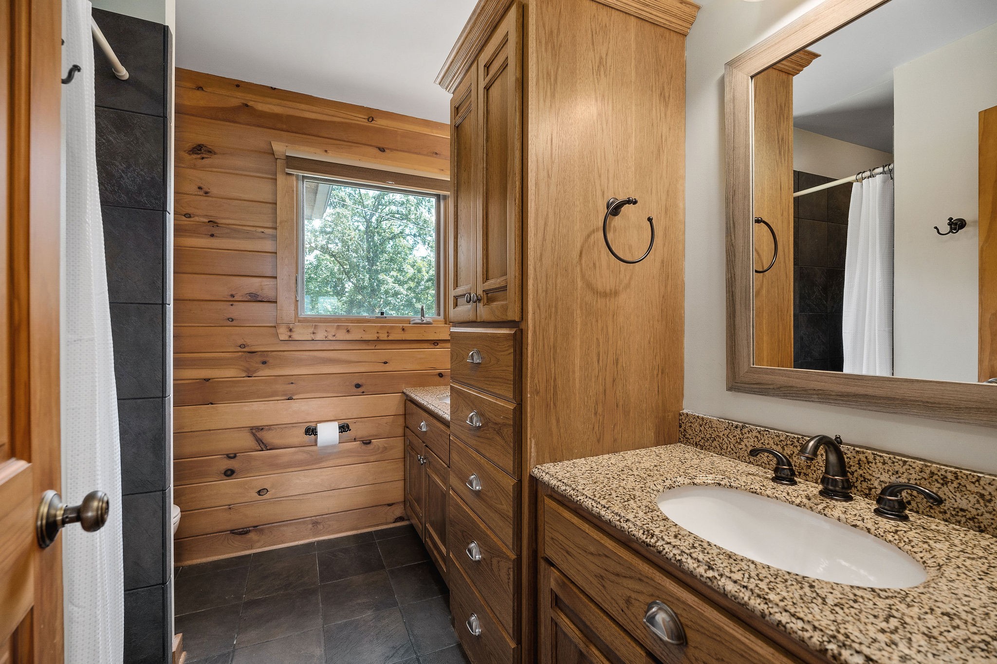 4415 Coconut Ridge Road Smithville, TN 37166 - Photo 25 of 52 a bathroom with a granite countertop sink toilet and shower