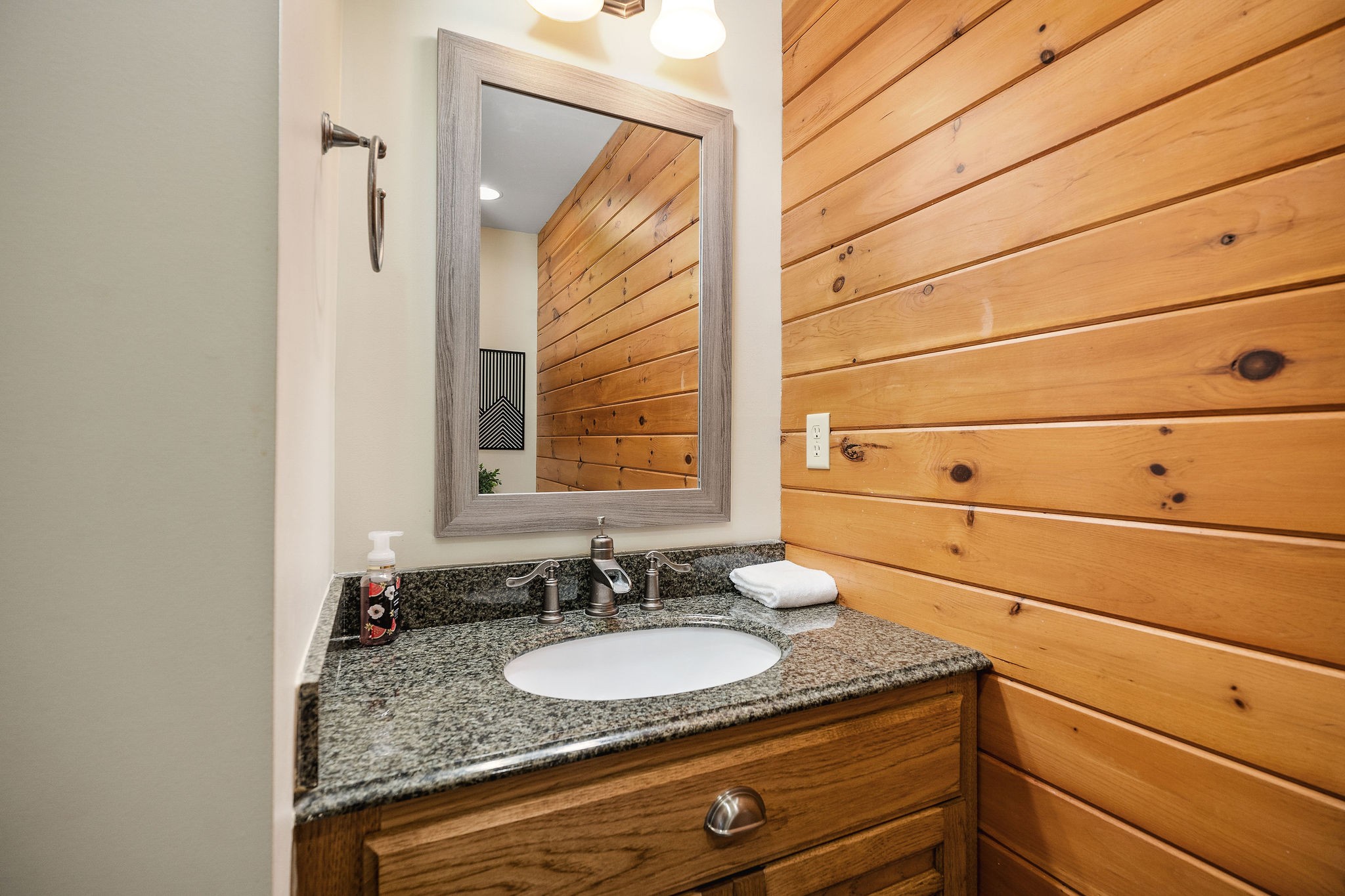 4415 Coconut Ridge Road Smithville, TN 37166 - Photo 29 of 52 a bathroom with a granite countertop sink and a mirror