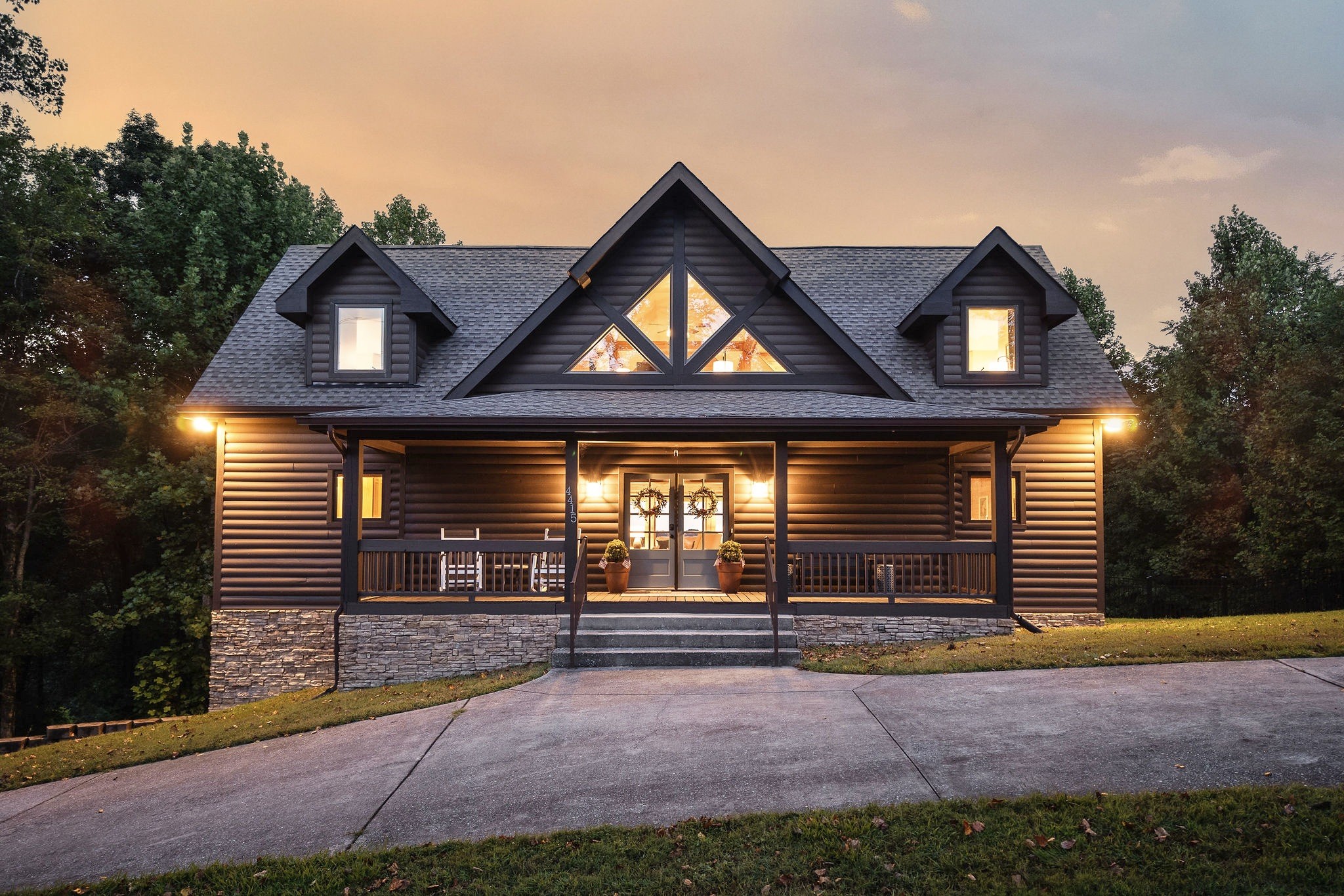 4415 Coconut Ridge Road Smithville, TN 37166 - Photo 3 of 52 a front view of a house with a yard and garage
