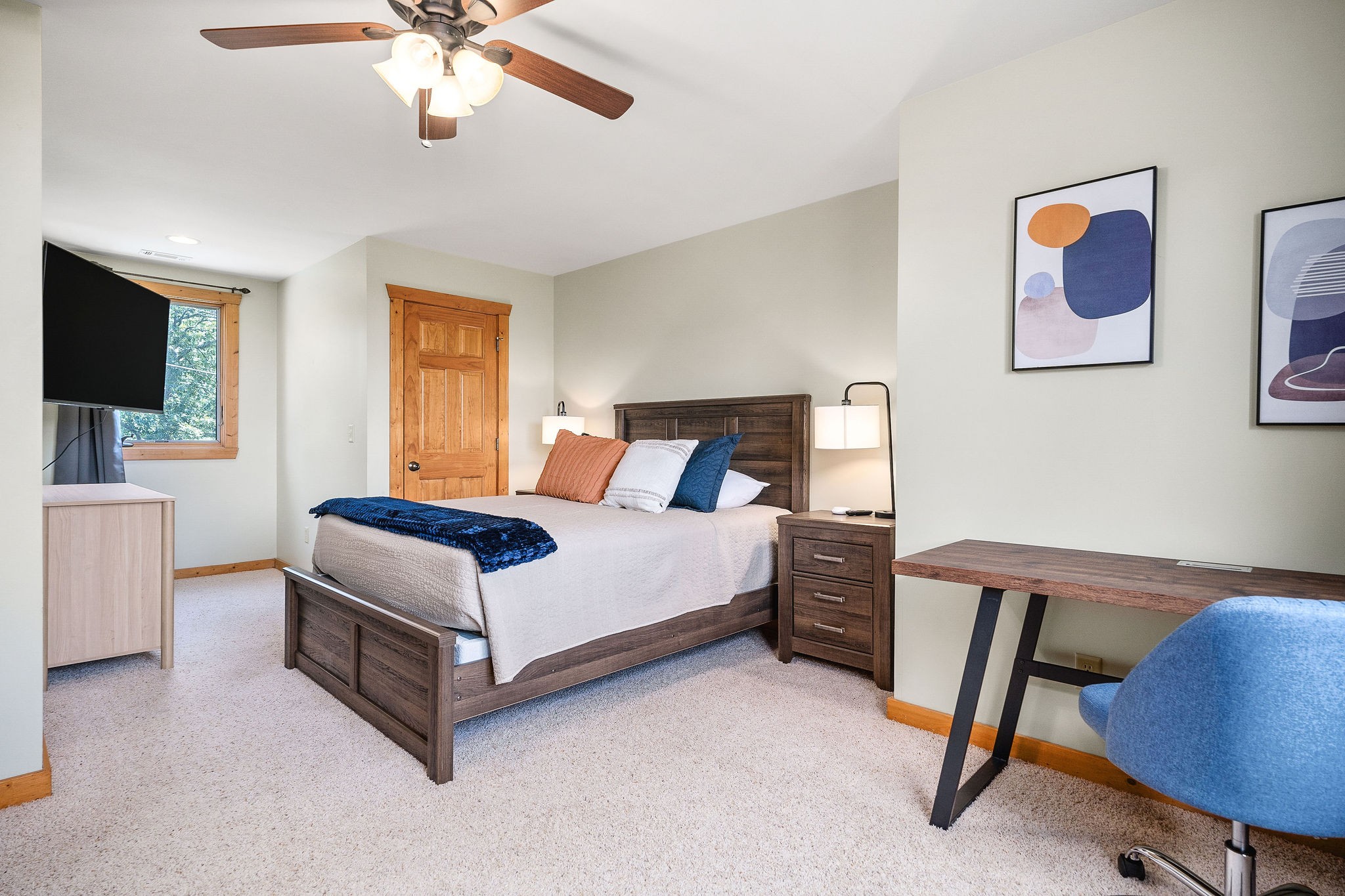 4415 Coconut Ridge Road Smithville, TN 37166 - Photo 36 of 52 a bedroom with a bed and a chandelier