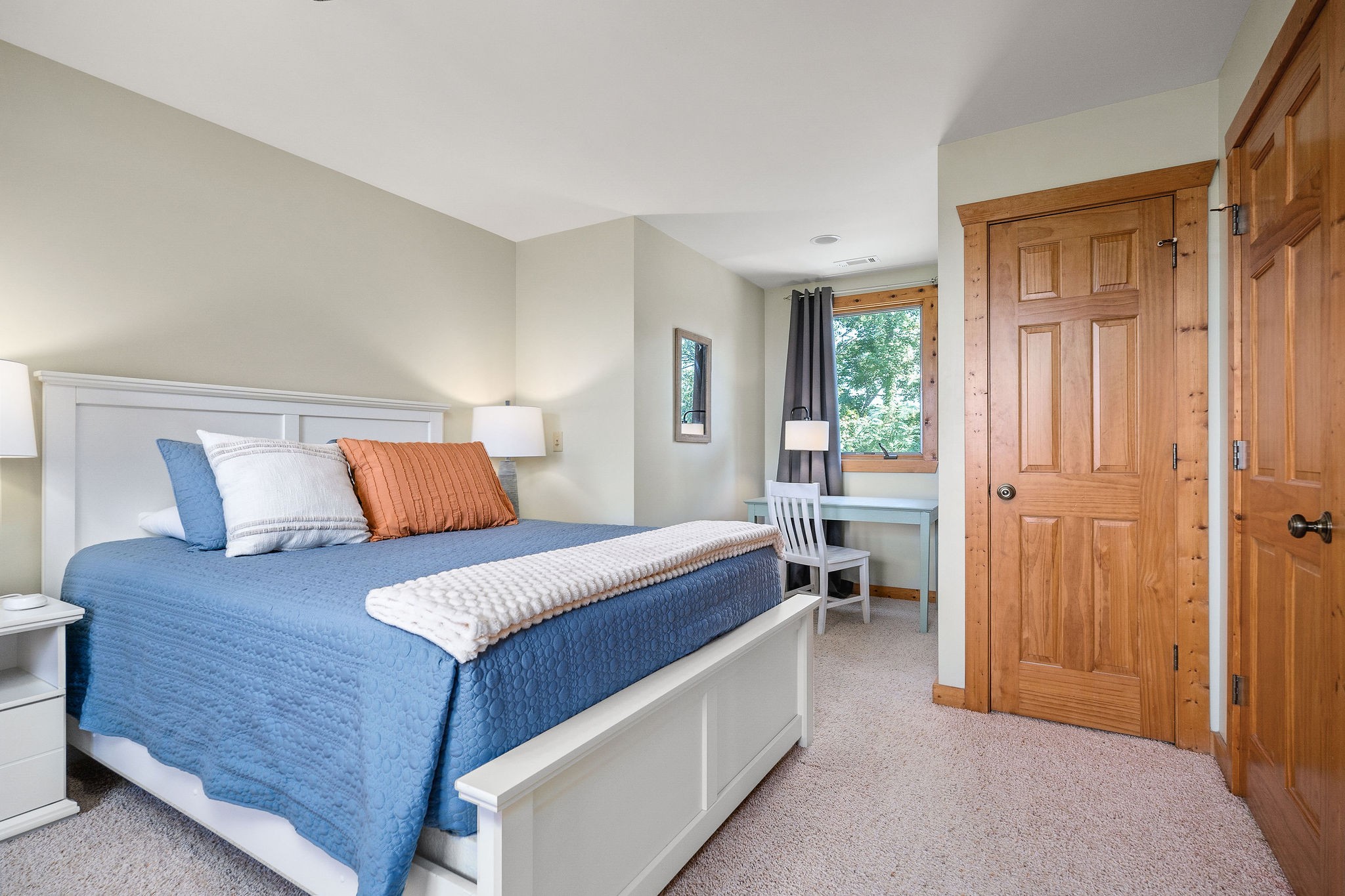 4415 Coconut Ridge Road Smithville, TN 37166 - Photo 39 of 52 a large bedroom with a bed and wooden floor