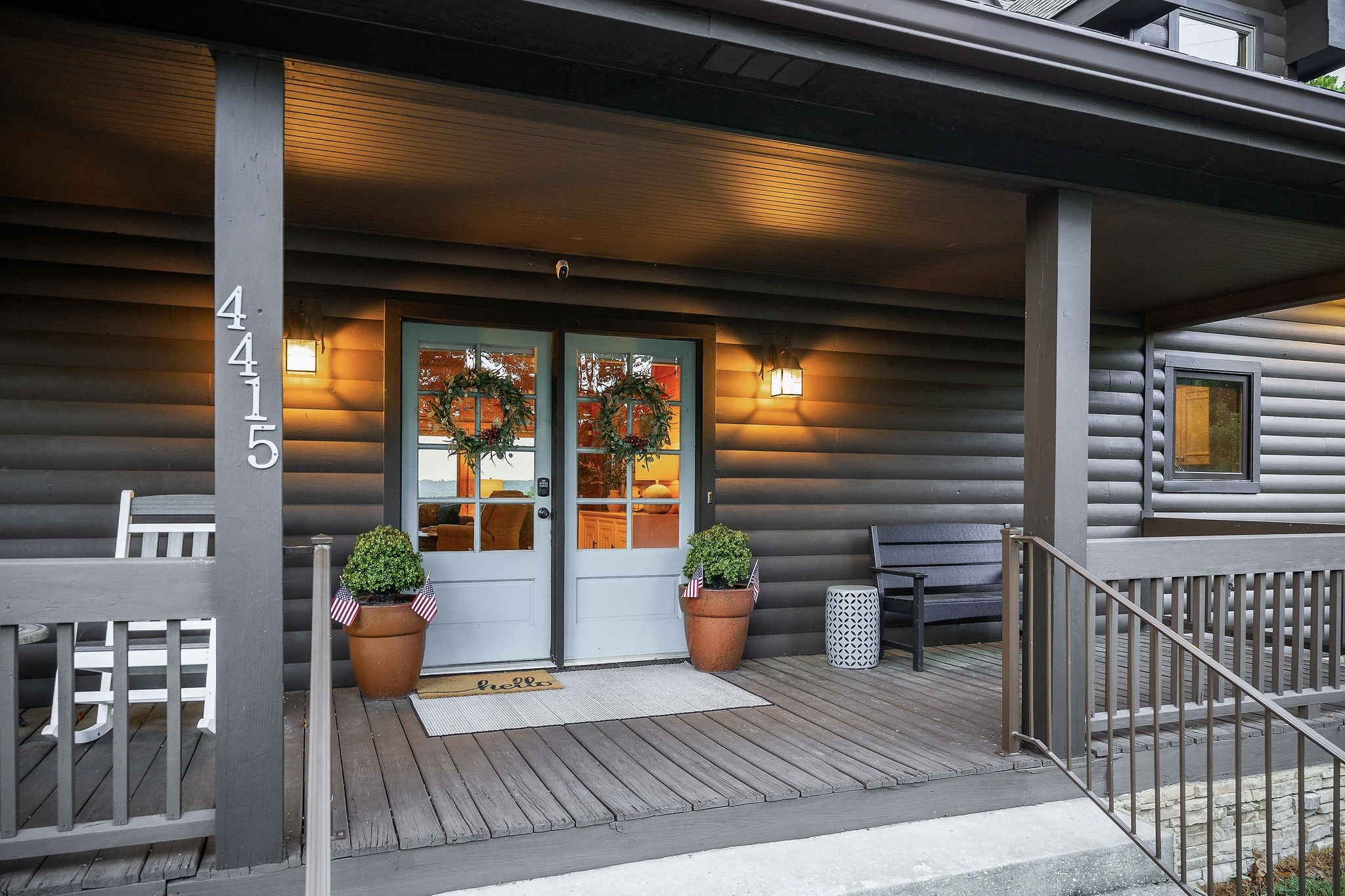 4415 Coconut Ridge Road Smithville, TN 37166 - Photo 4 of 52 a view of a porch with chairs and potted plants