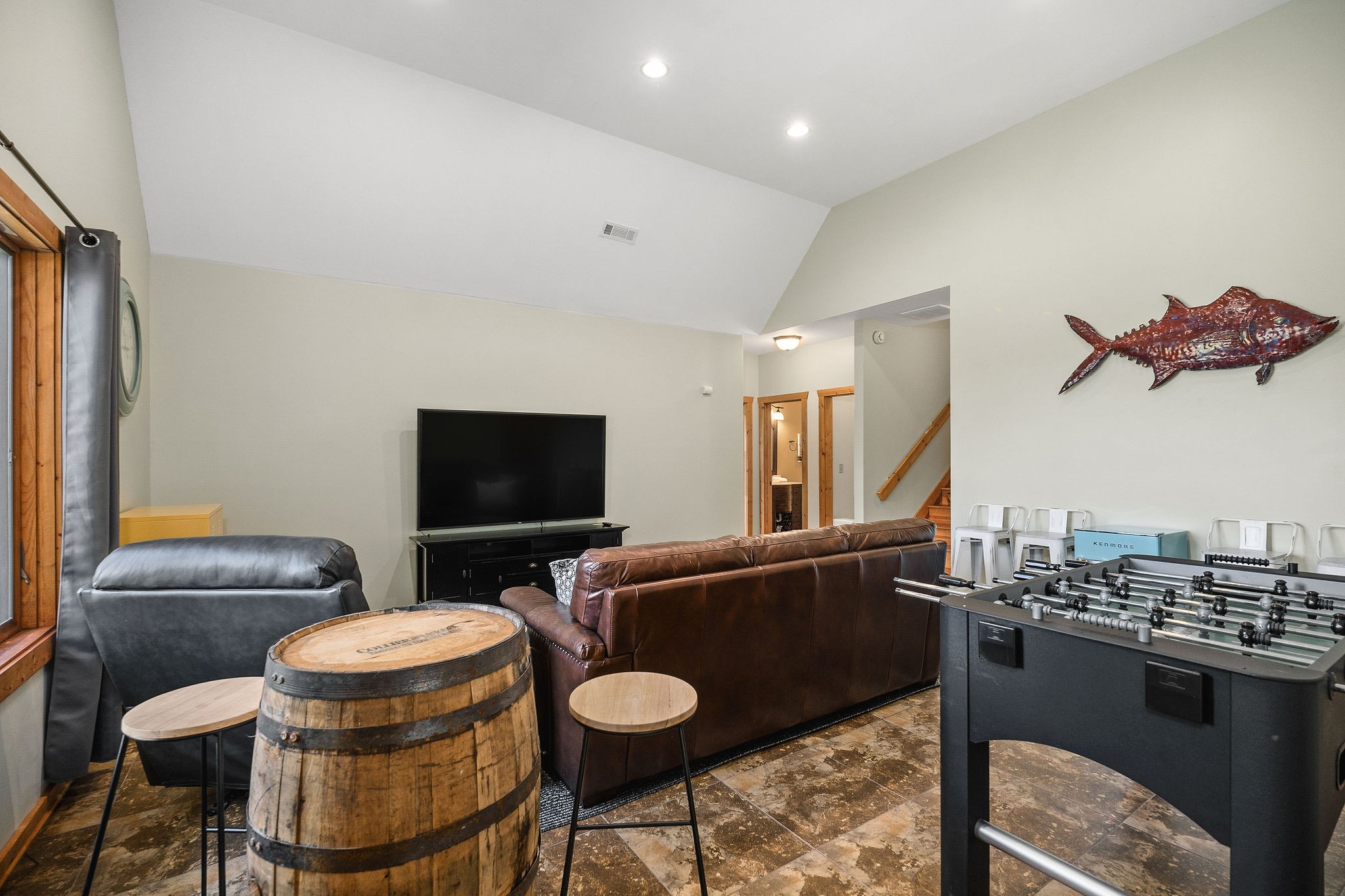 4415 Coconut Ridge Road Smithville, TN 37166 - Photo 42 of 52 a living room with furniture a flat screen tv and a large window