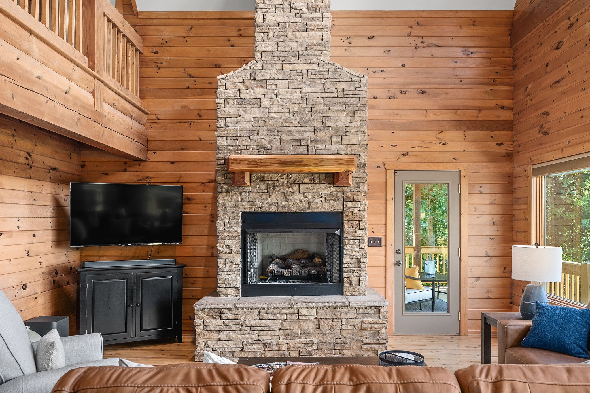 4415 Coconut Ridge Road Smithville, TN 37166 - Photo 10 of 52 a living room with fireplace furniture and a flat screen tv