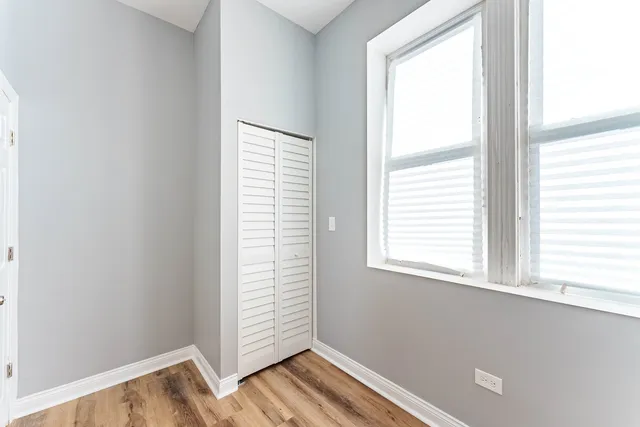 a view of an empty room and window
