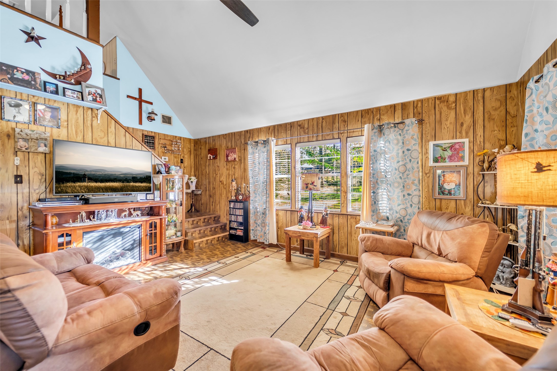 590 Cove Loop Coldspring, TX 77331 - Photo 21 of 36 a living room with furniture and a flat screen tv