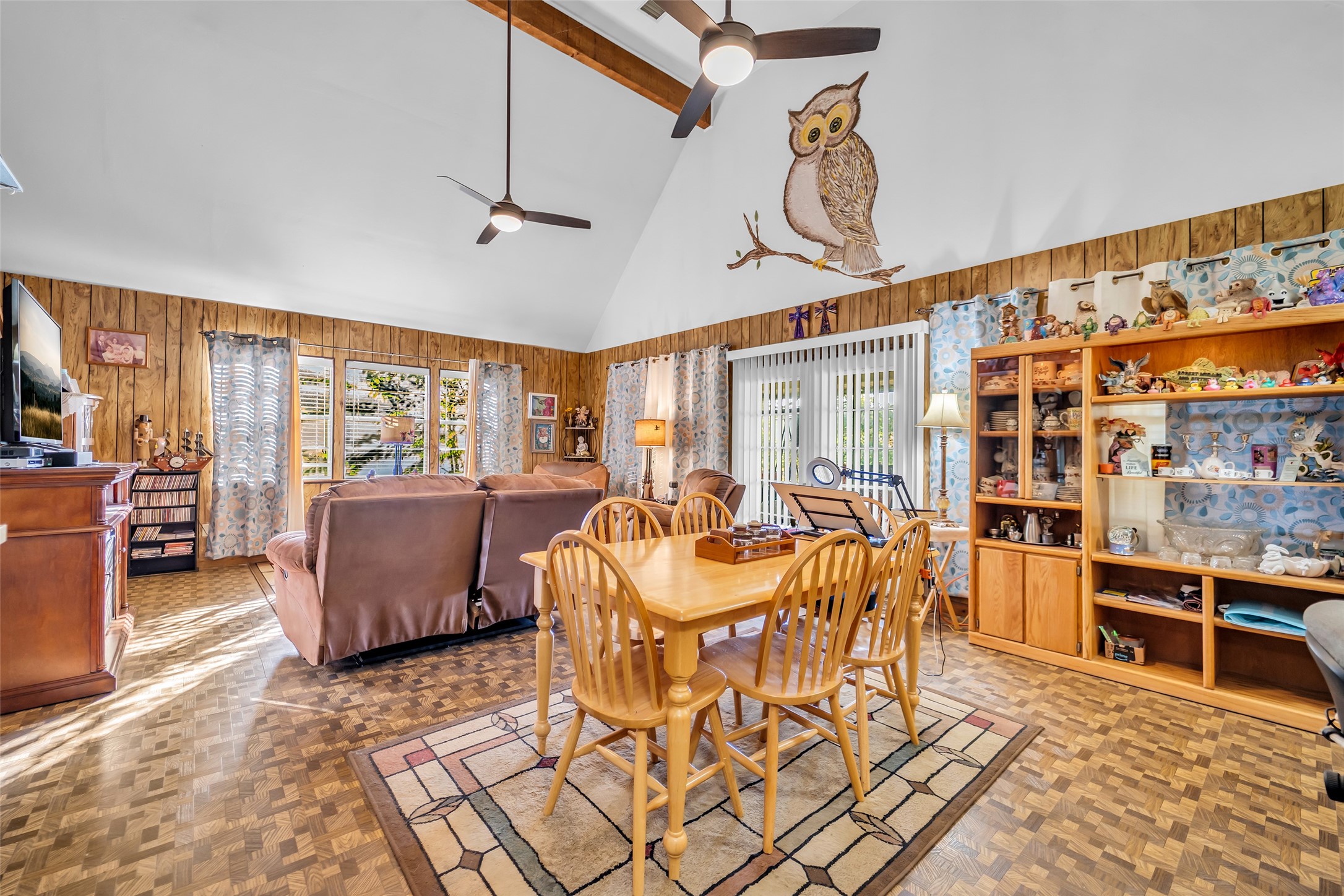 590 Cove Loop Coldspring, TX 77331 - Photo 25 of 36 a living room with furniture a flat screen tv and a floor to ceiling window