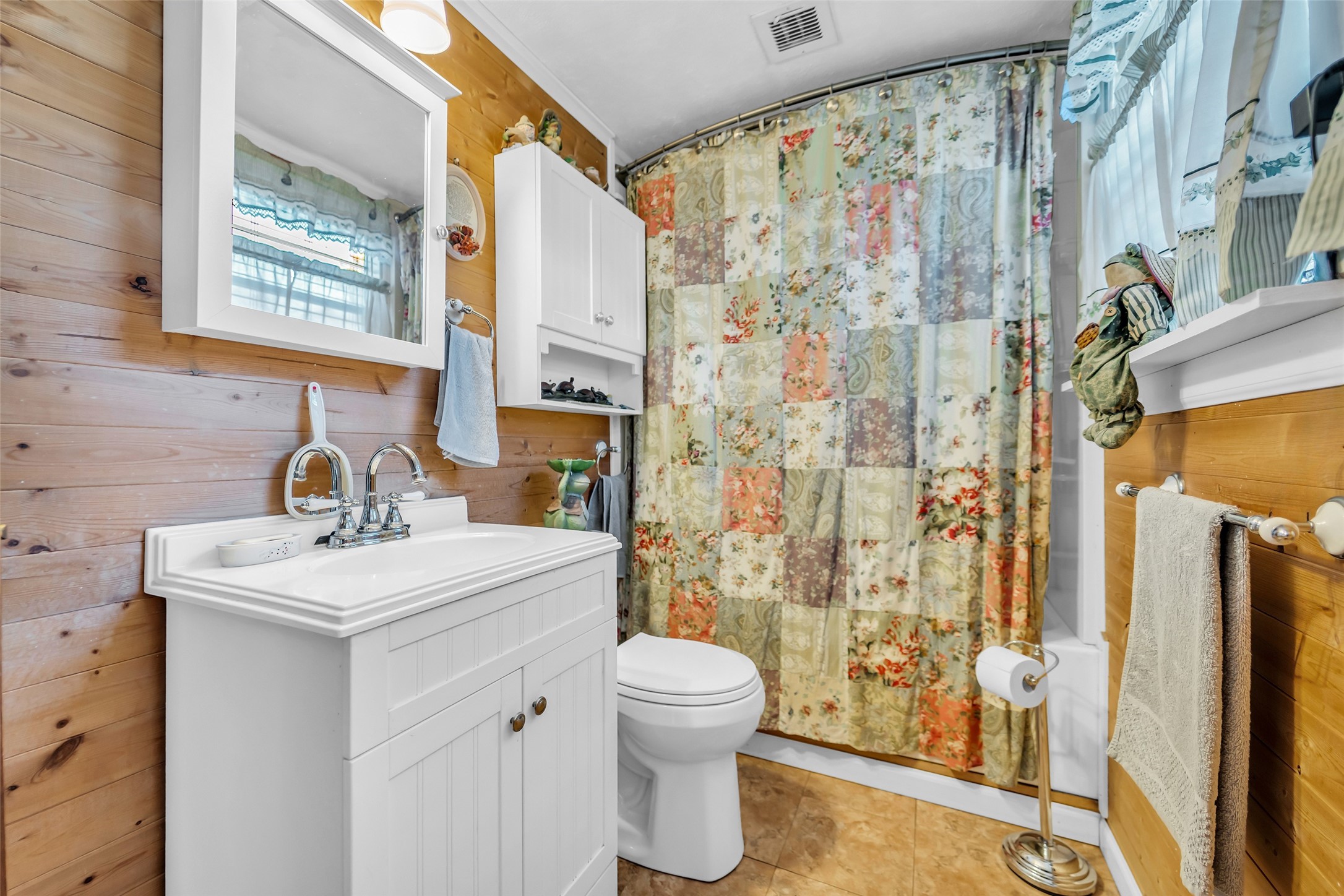 590 Cove Loop Coldspring, TX 77331 - Photo 26 of 36 a bathroom with a sink toilet and shower