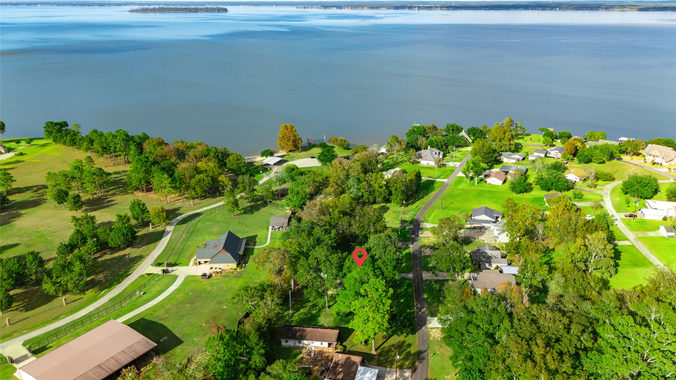 590 Cove Loop Coldspring, TX 77331 - Photo 8 of 36 a backyard of a house with lots of green space and garden view
