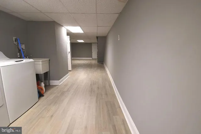 a room with furniture and a chair