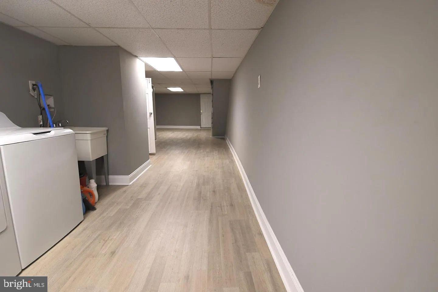 83 North State Road Upper Darby, PA 19082 - Photo 21 of 27 a view of a hallway with wooden floor