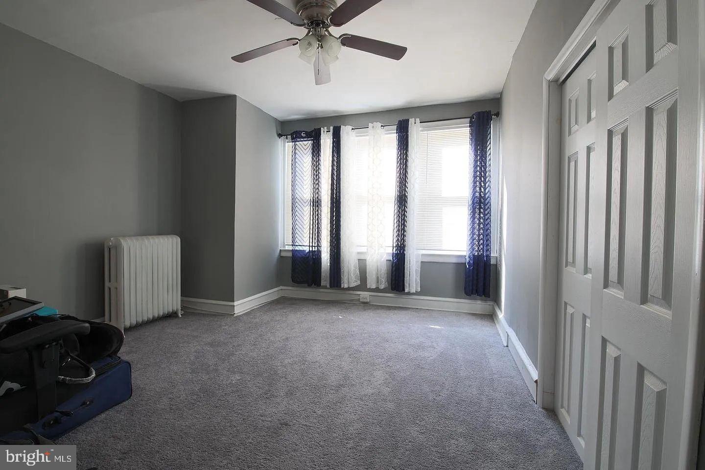 83 North State Road Upper Darby, PA 19082 - Photo 24 of 27 a view of a livingroom with a staircase