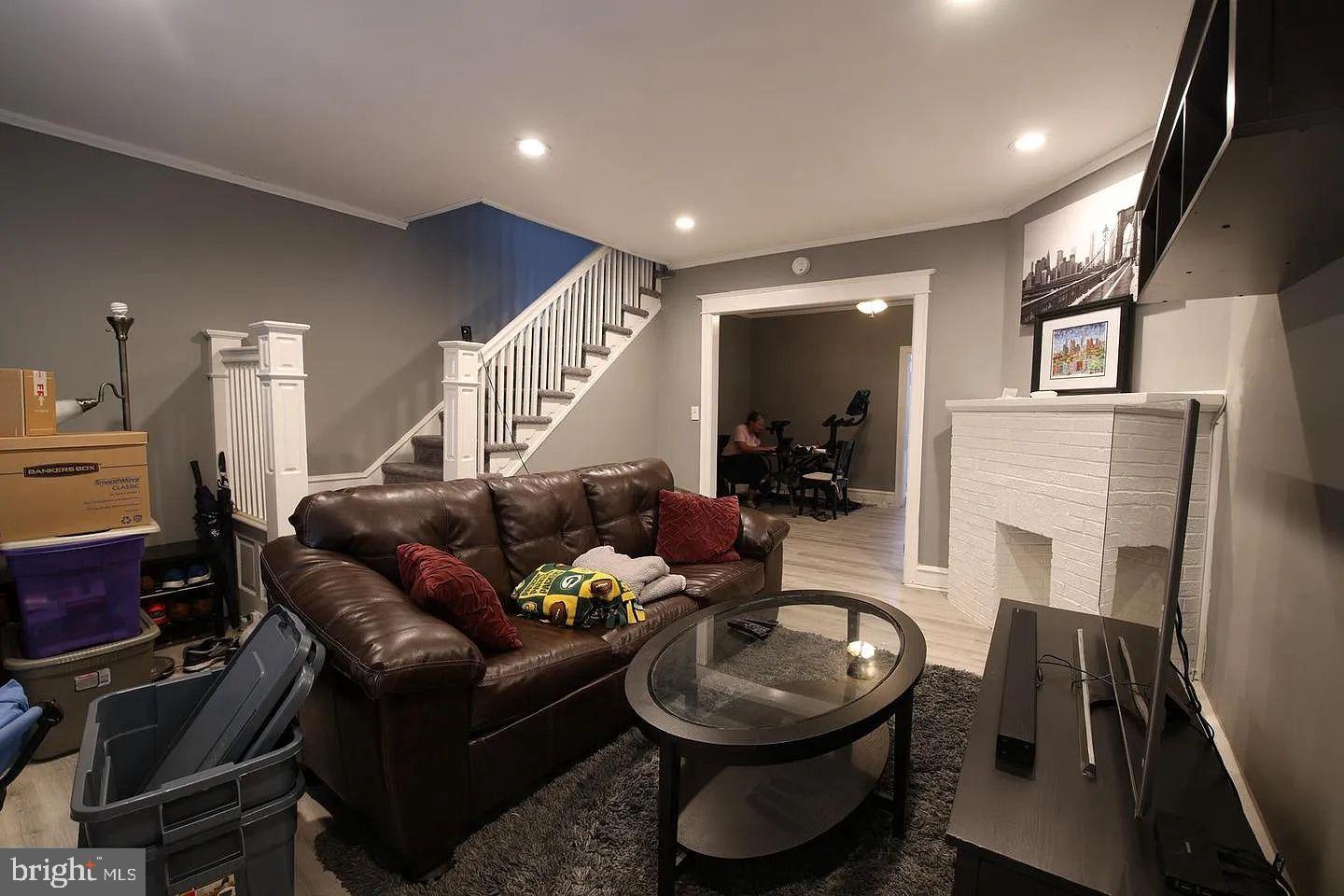 83 North State Road Upper Darby, PA 19082 - Photo 4 of 27 a living room with furniture and a fireplace