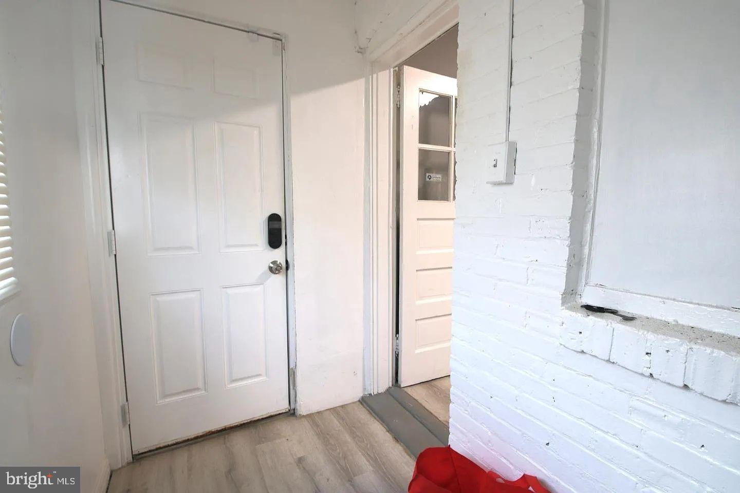 83 North State Road Upper Darby, PA 19082 - Photo 7 of 27 a view of a hallway with wooden floor