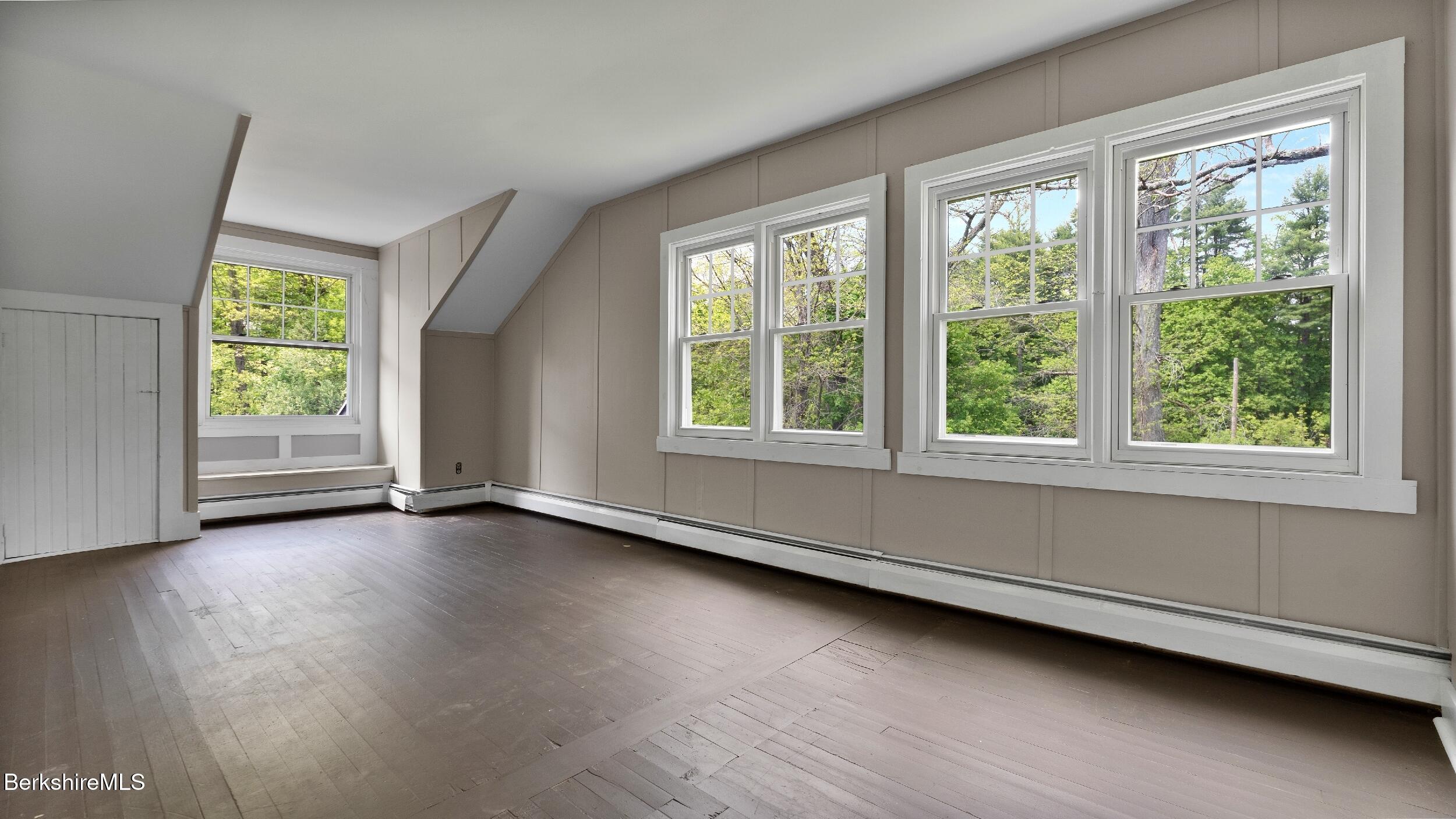 20 East Dugway Road Lenox, MA 01240 - Photo 43 of 84 an empty room with wooden floor and windows