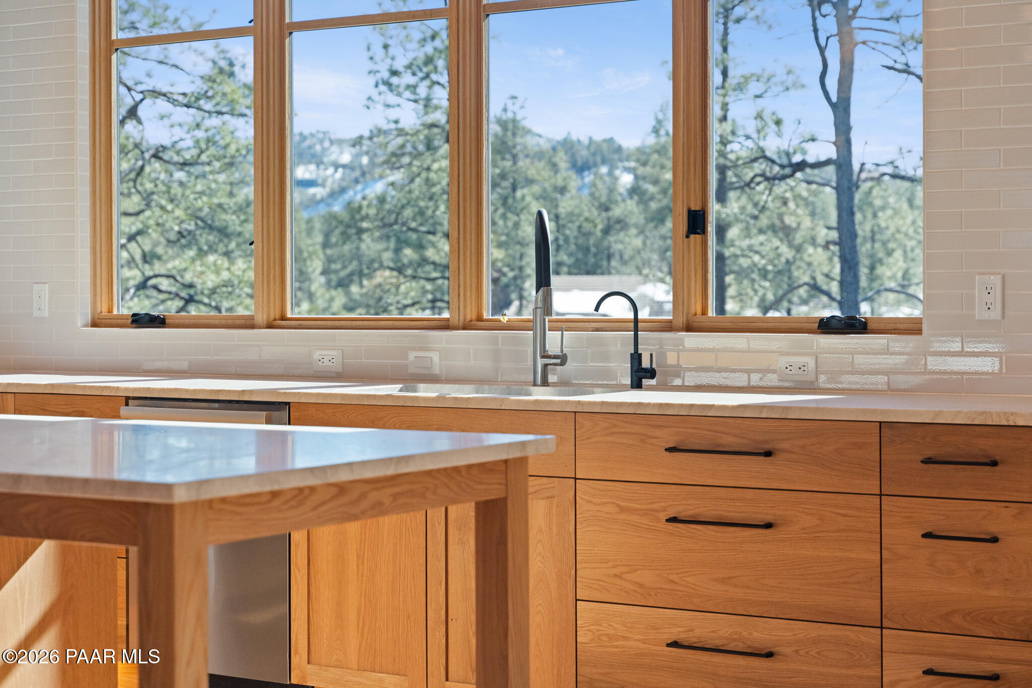 1090 High Valley Ranch Road Prescott, AZ 86303 - Photo 11 of 65 a view of a sink and dishwasher with a large window