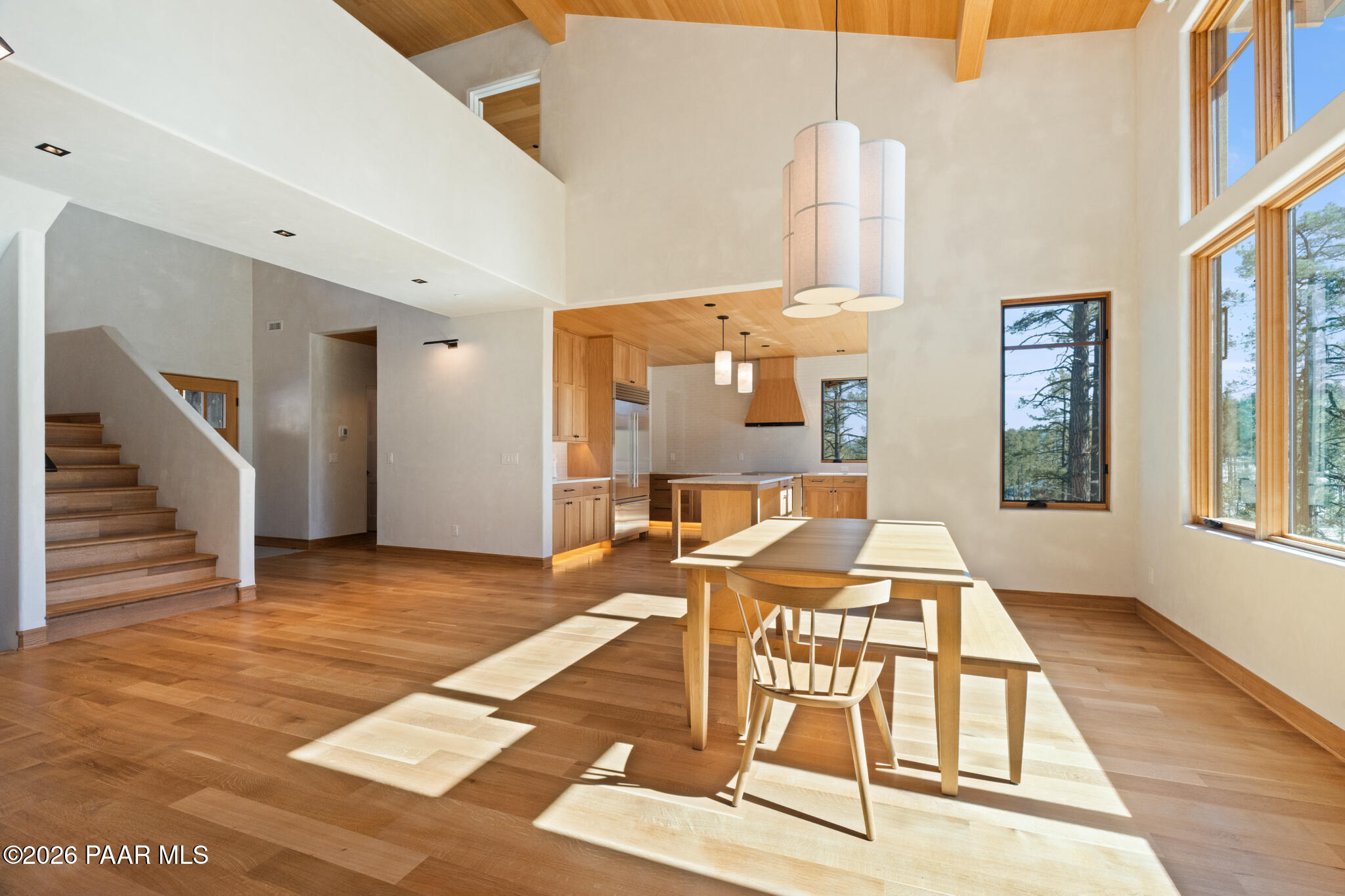 1090 High Valley Ranch Road Prescott, AZ 86303 - Photo 14 of 65 a view of a livingroom with furniture wooden floor and windows