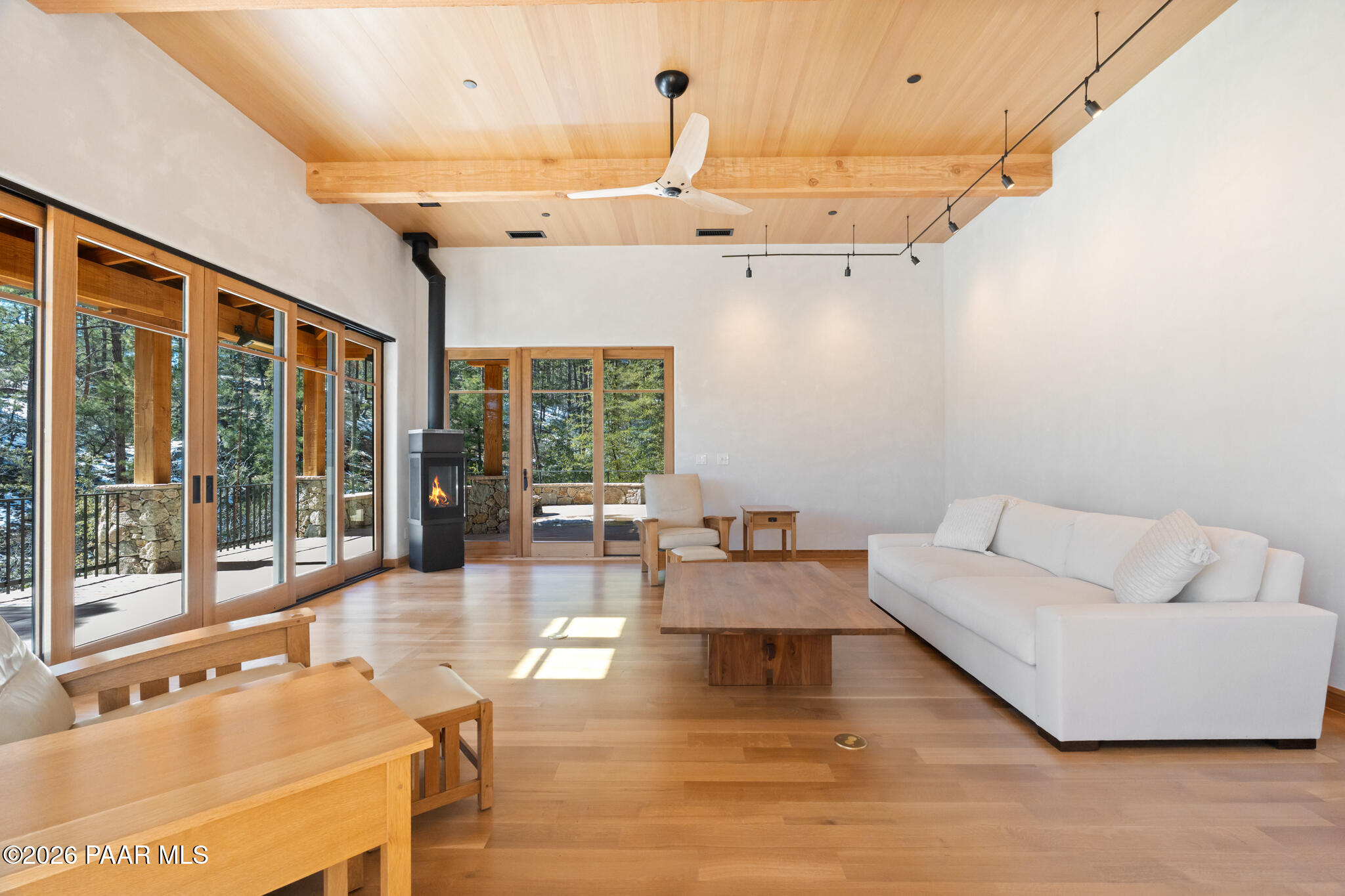 1090 High Valley Ranch Road Prescott, AZ 86303 - Photo 17 of 65 a living room with furniture and a large window