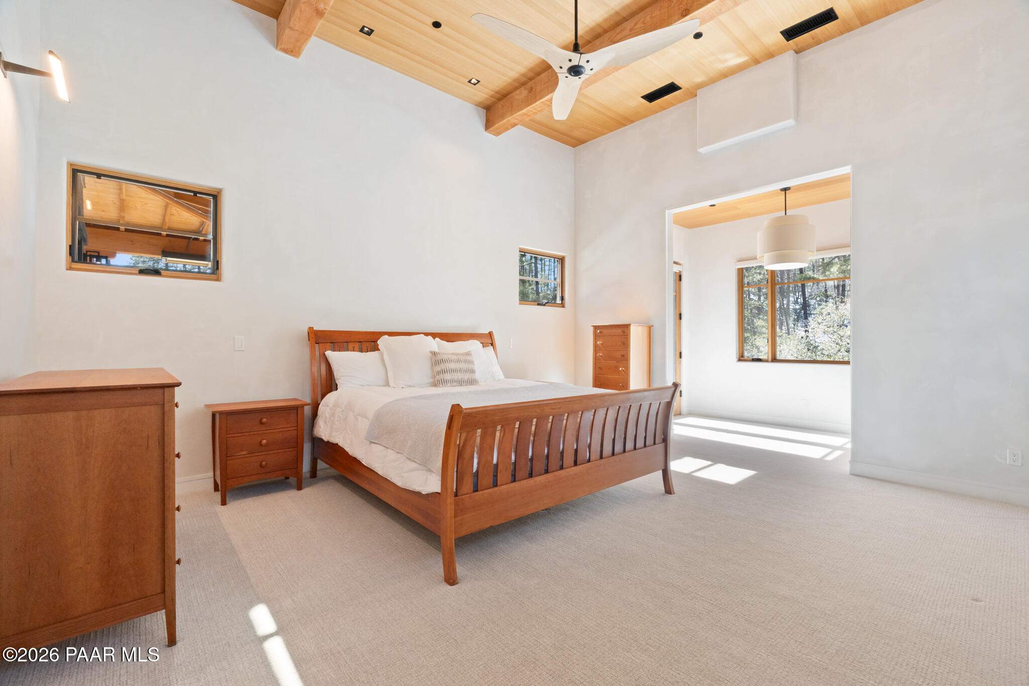 1090 High Valley Ranch Road Prescott, AZ 86303 - Photo 28 of 65 a bedroom with a bed and window