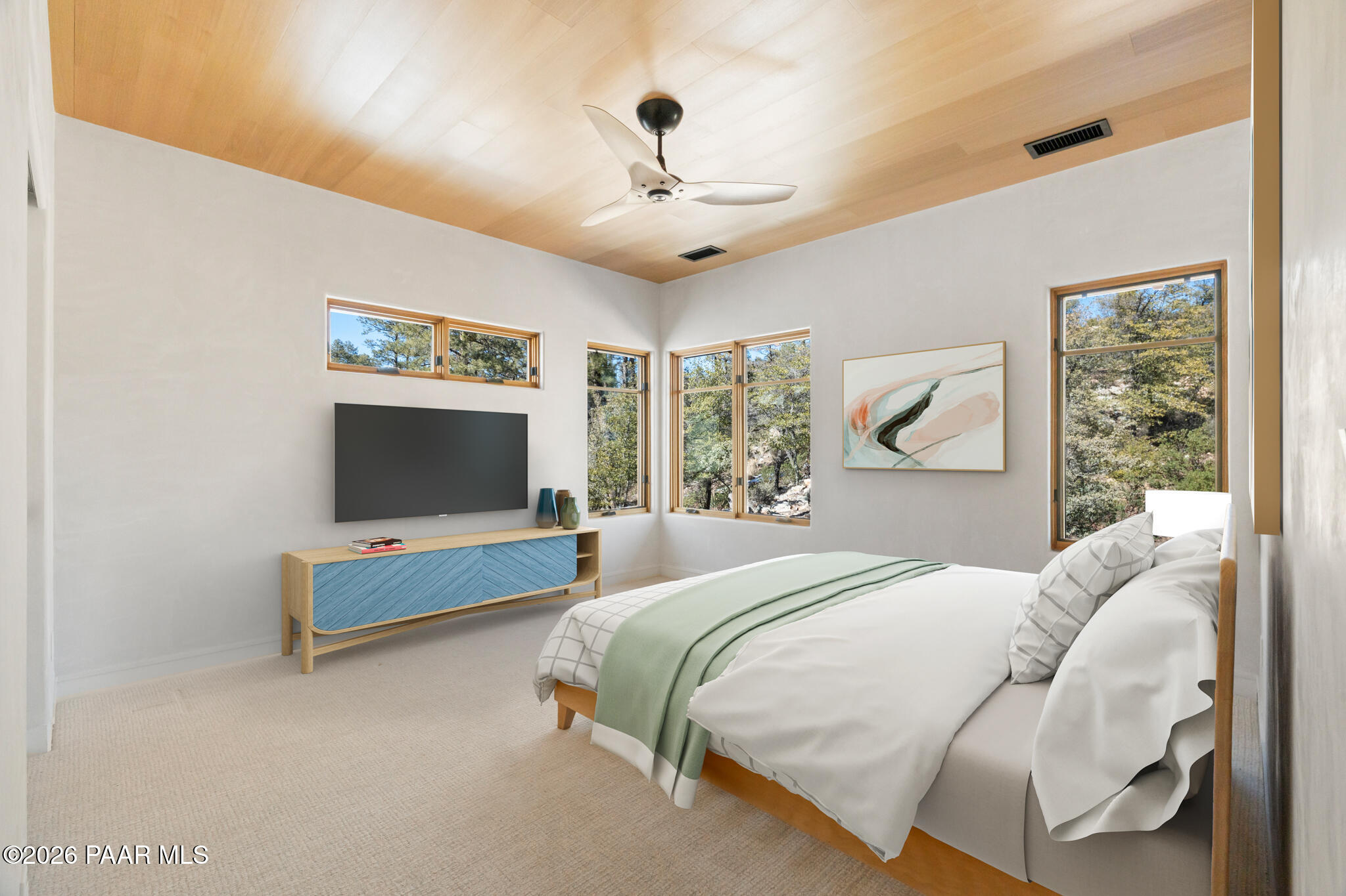 1090 High Valley Ranch Road Prescott, AZ 86303 - Photo 35 of 65 a bedroom with a bed and a flat screen tv