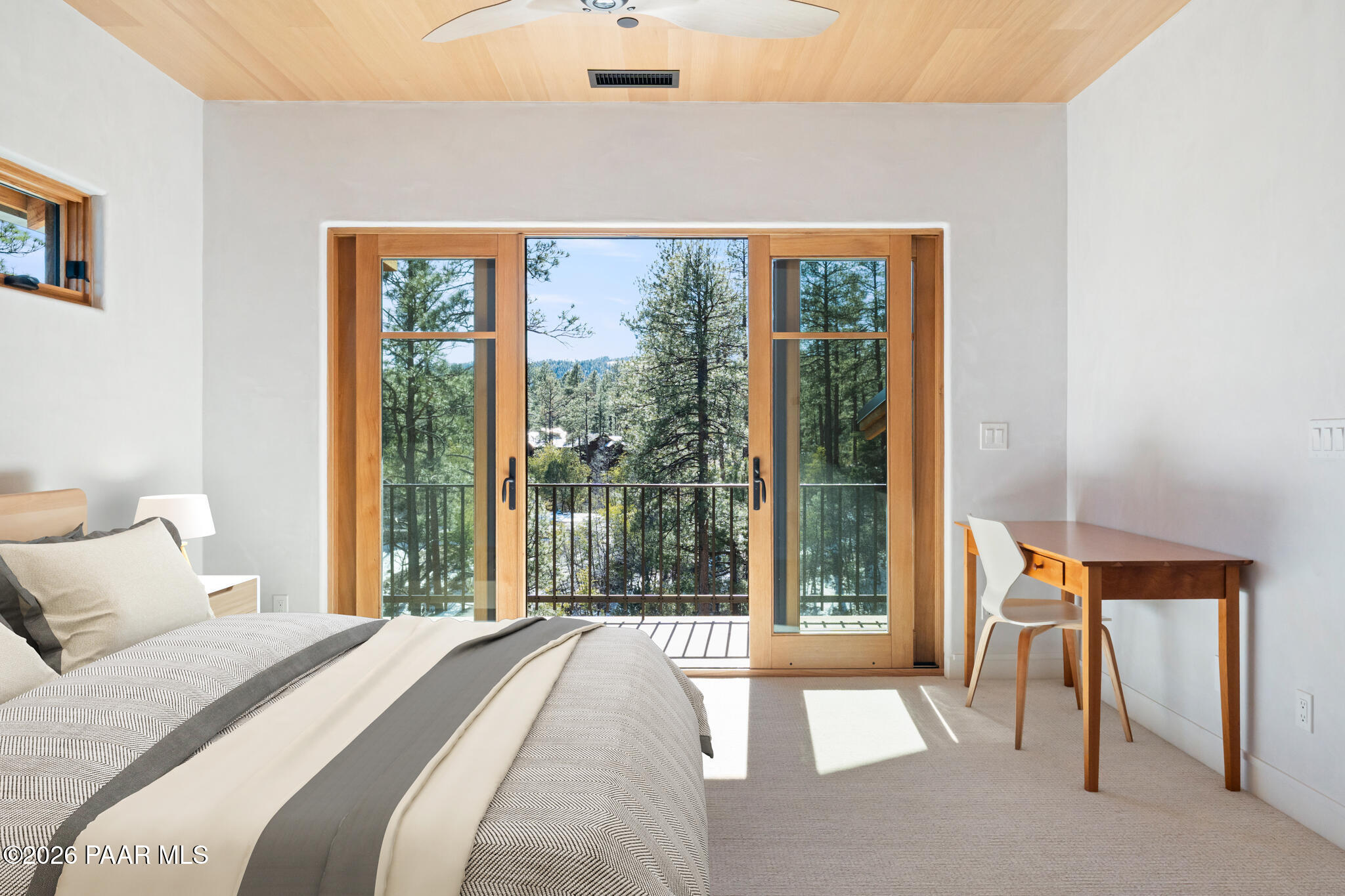 1090 High Valley Ranch Road Prescott, AZ 86303 - Photo 41 of 65 a bedroom with a bed and a large window