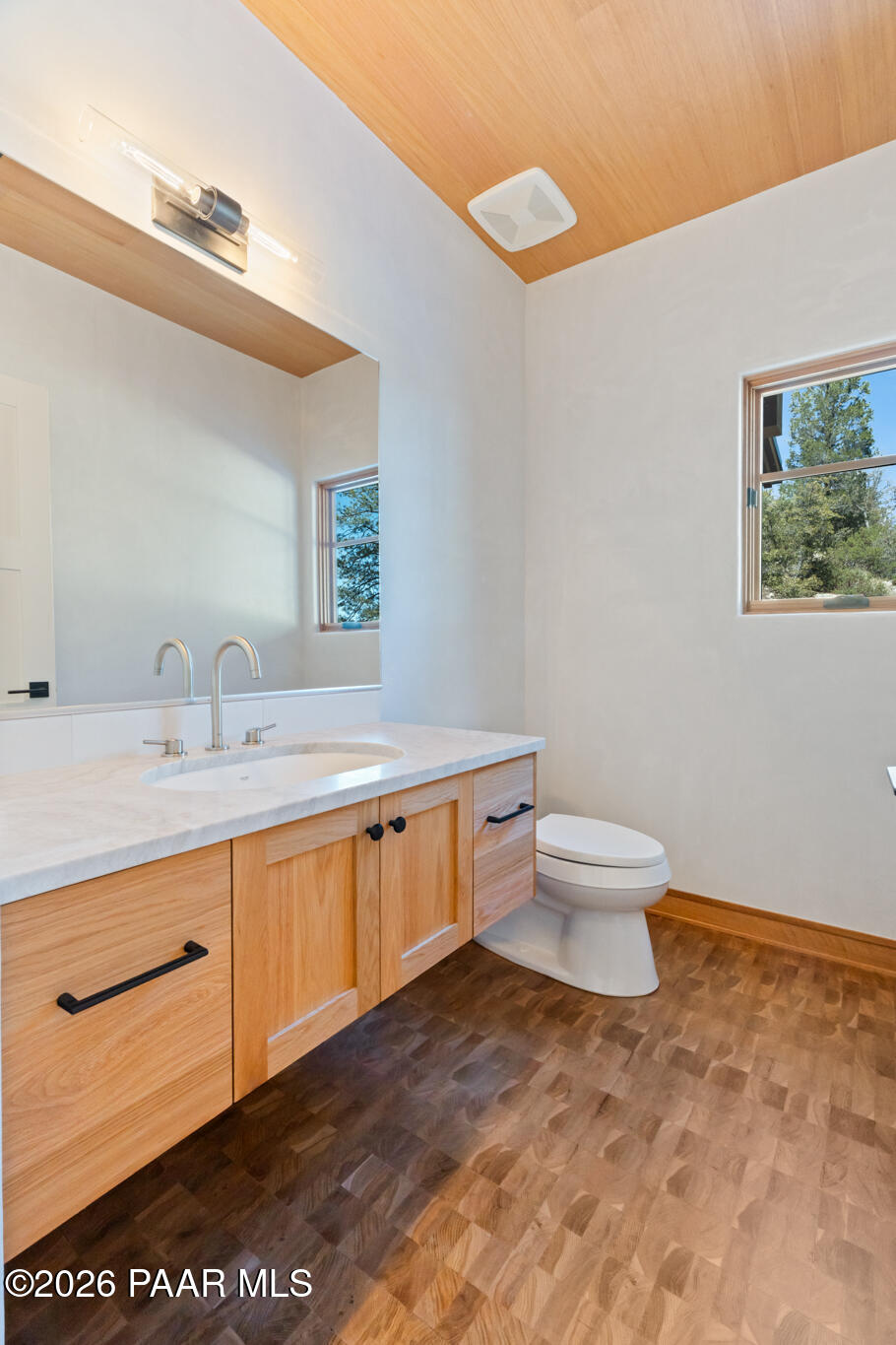 1090 High Valley Ranch Road Prescott, AZ 86303 - Photo 56 of 65 a bathroom with a toilet sink and mirror