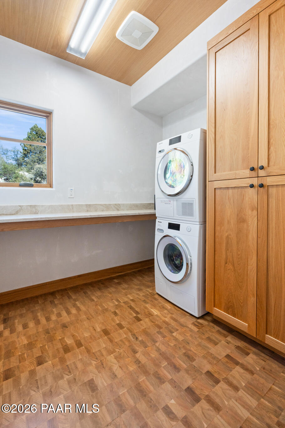 1090 High Valley Ranch Road Prescott, AZ 86303 - Photo 57 of 65 a view of a storage & utility room with a washer dryer