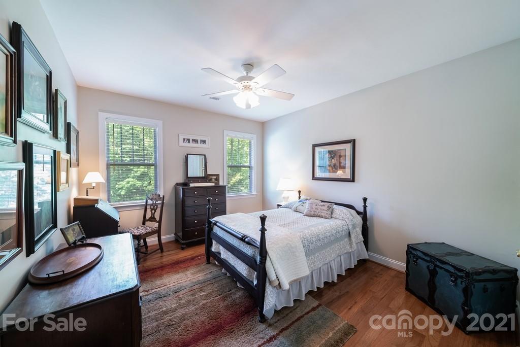 310 Bridle Path Farm Road Cleveland, NC 27013 - Photo 19 of 48 a bedroom with a bed and a couch