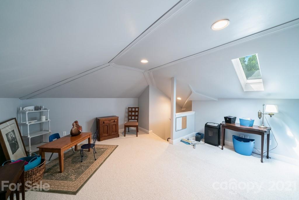 310 Bridle Path Farm Road Cleveland, NC 27013 - Photo 20 of 48 a bed room with furniture and a chair