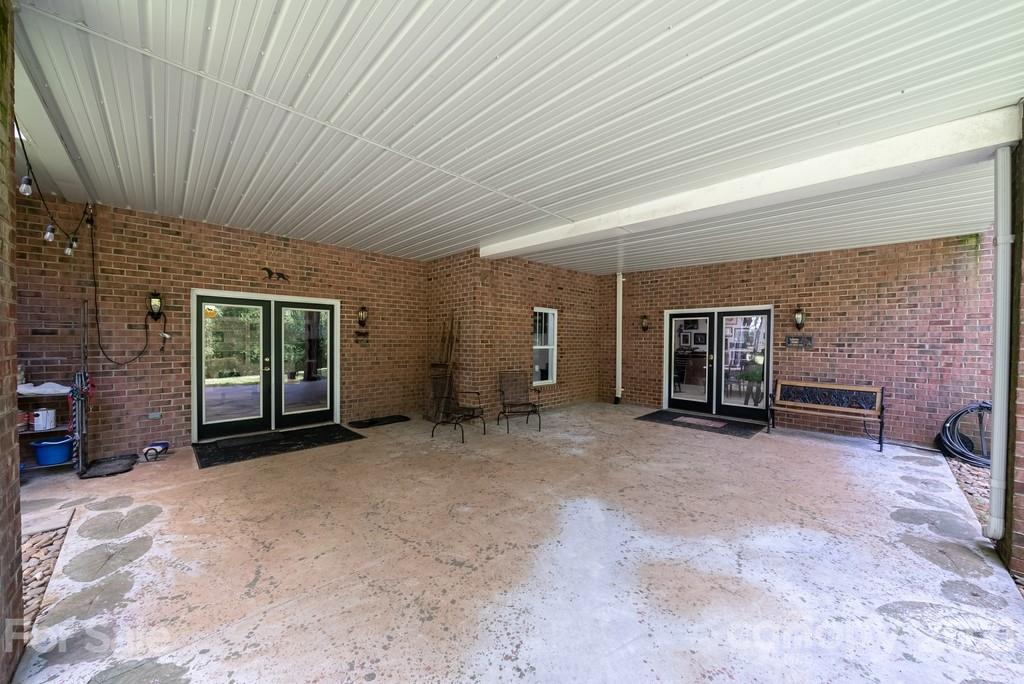310 Bridle Path Farm Road Cleveland, NC 27013 - Photo 29 of 48 a view of a livingroom with furniture and a window