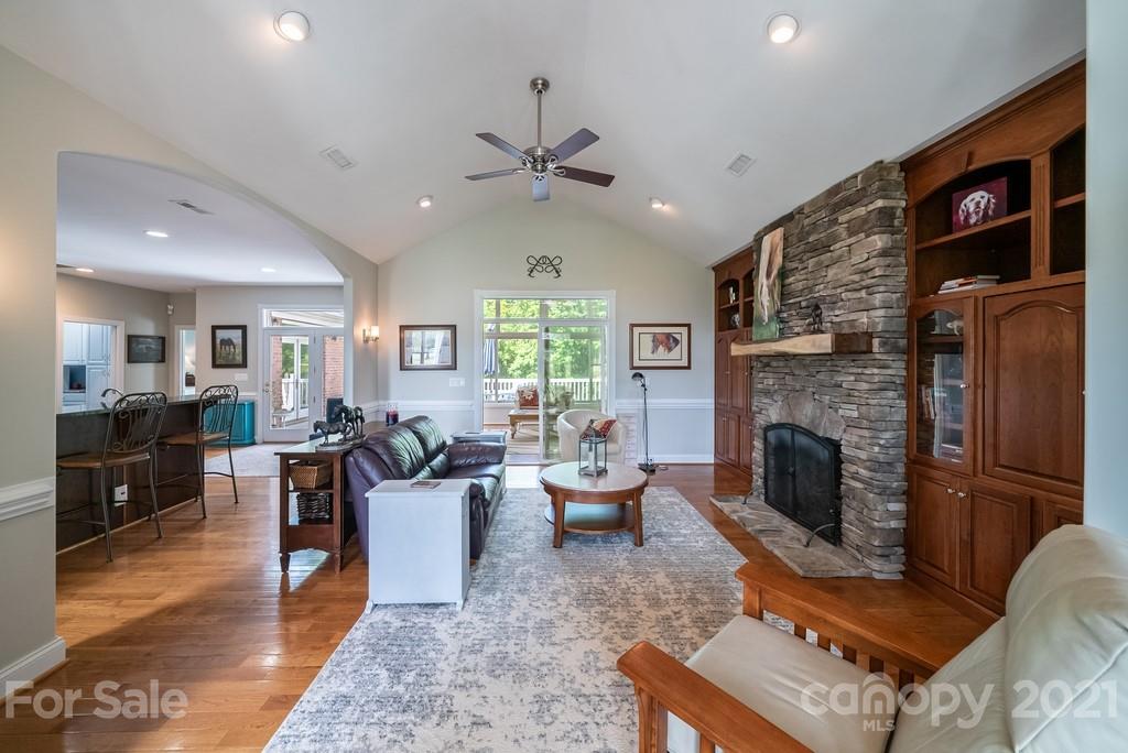 310 Bridle Path Farm Road Cleveland, NC 27013 - Photo 5 of 48 a living room with furniture or wooden floor and a fireplace