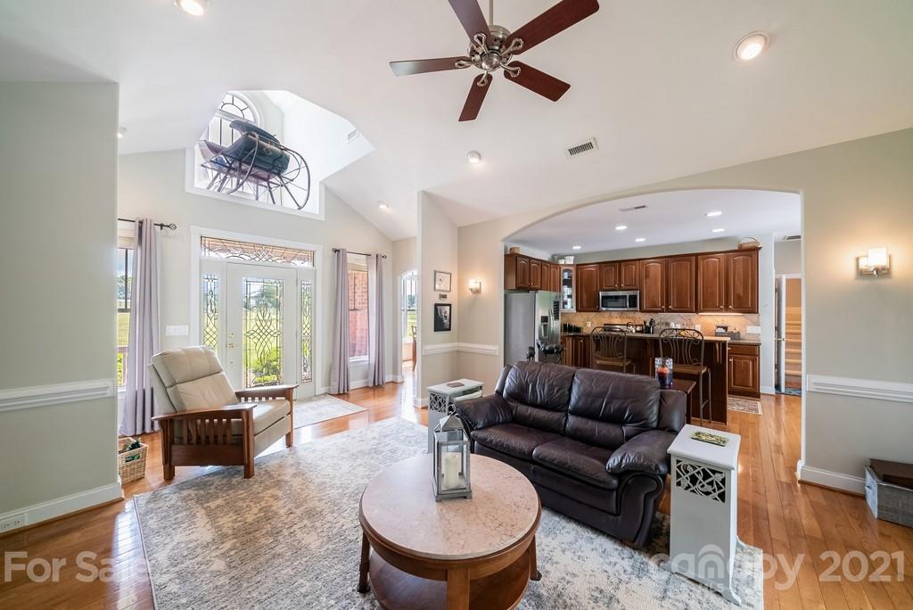 310 Bridle Path Farm Road Cleveland, NC 27013 - Photo 7 of 48 a living room with furniture and a view of kitchen