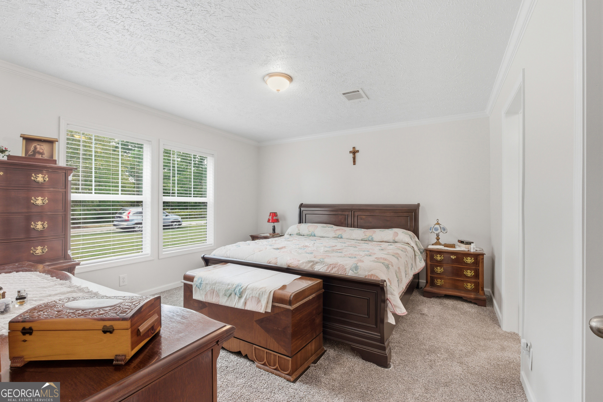 219 Eastanollee Road Eastanollee, GA 30538 - Photo 15 of 49 a bedroom with a bed and a window
