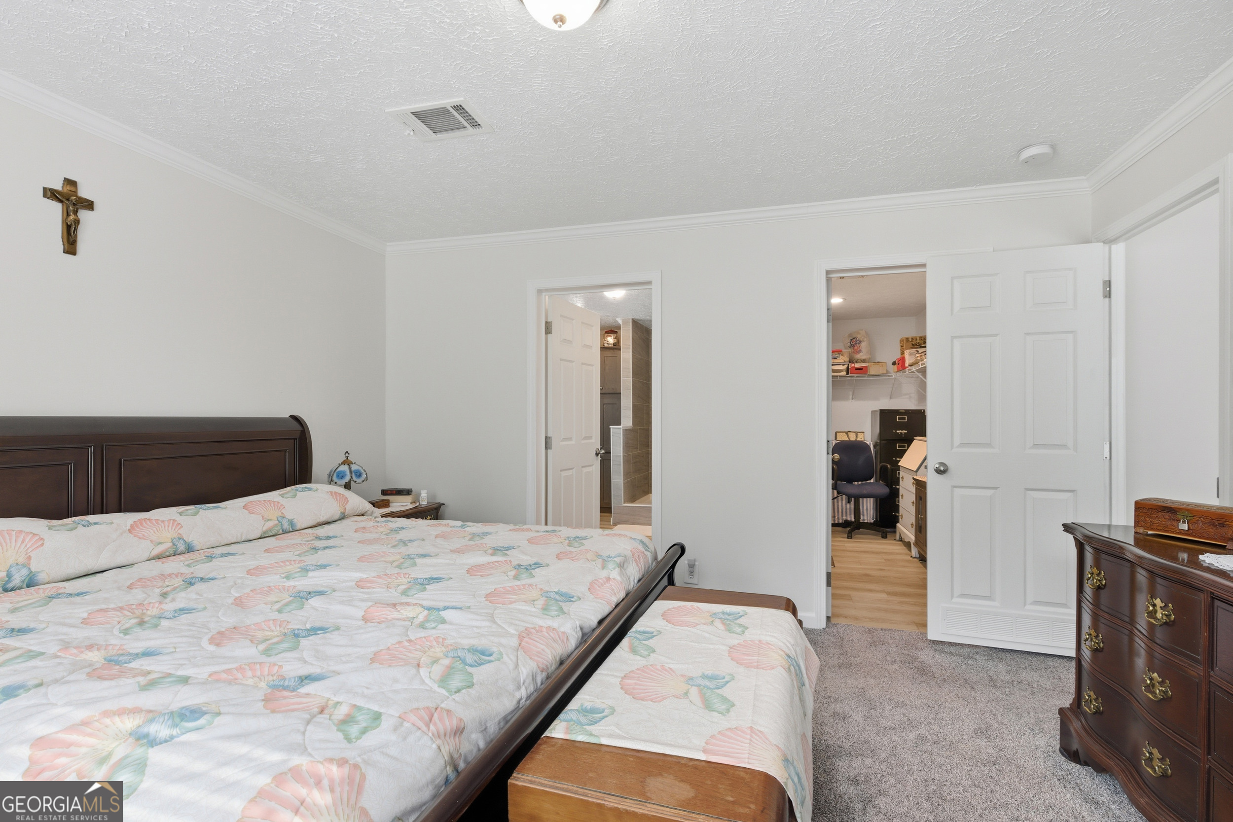 219 Eastanollee Road Eastanollee, GA 30538 - Photo 16 of 49 a bedroom with a bed and a view of kitchen