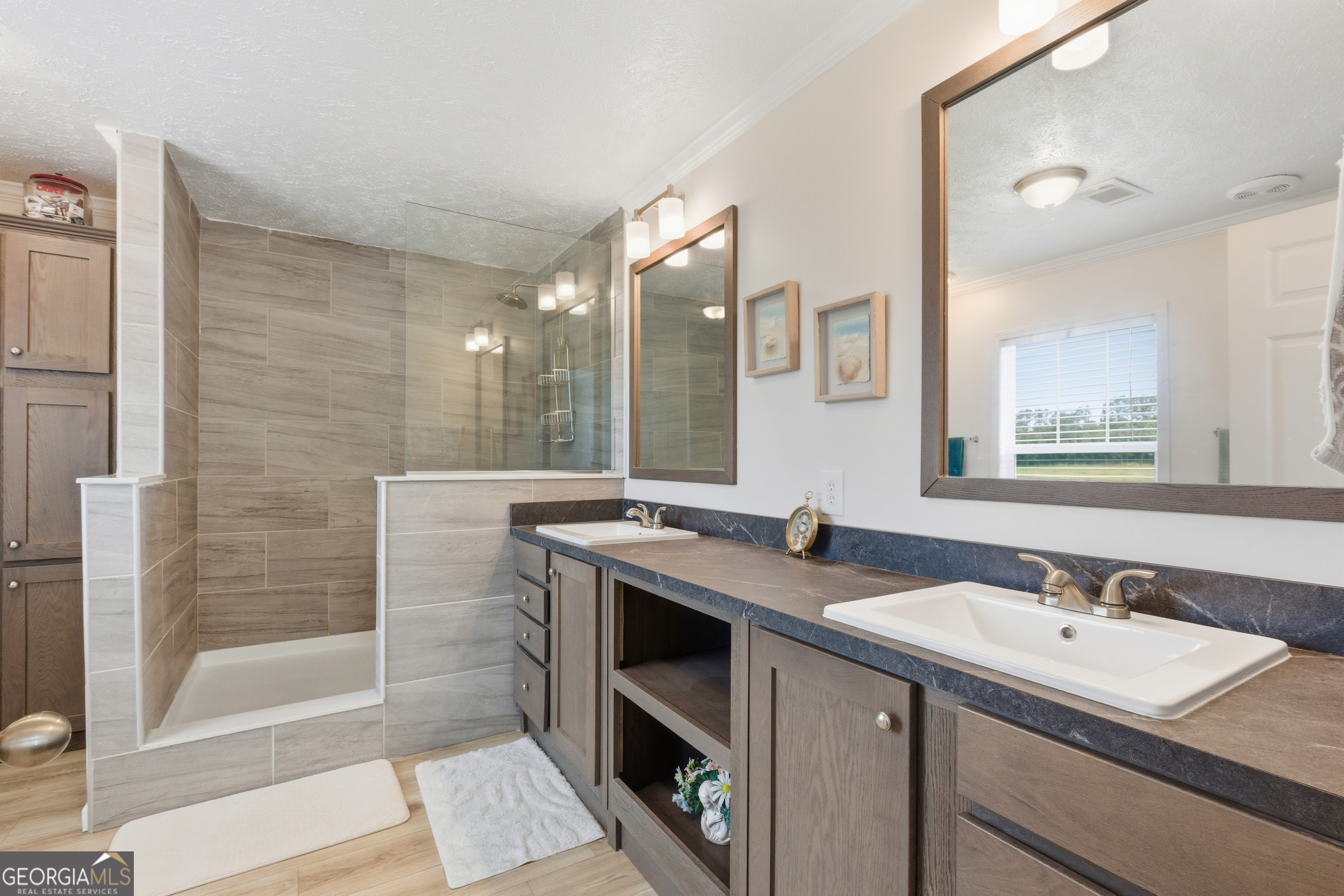 219 Eastanollee Road Eastanollee, GA 30538 - Photo 17 of 49 a bathroom with a sink and a mirror