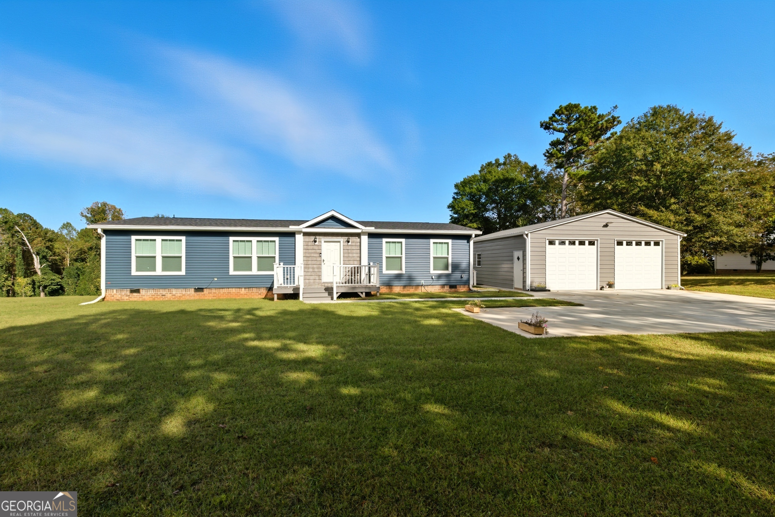 219 Eastanollee Road Eastanollee, GA 30538 - Photo 2 of 49 a front view of a house with a yard