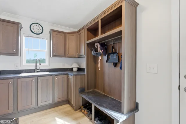 a view of cabinets and wooden floor