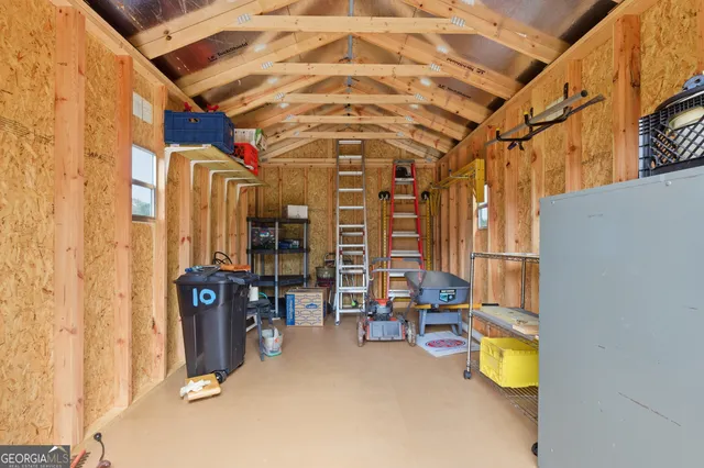 a view of a garage with cars
