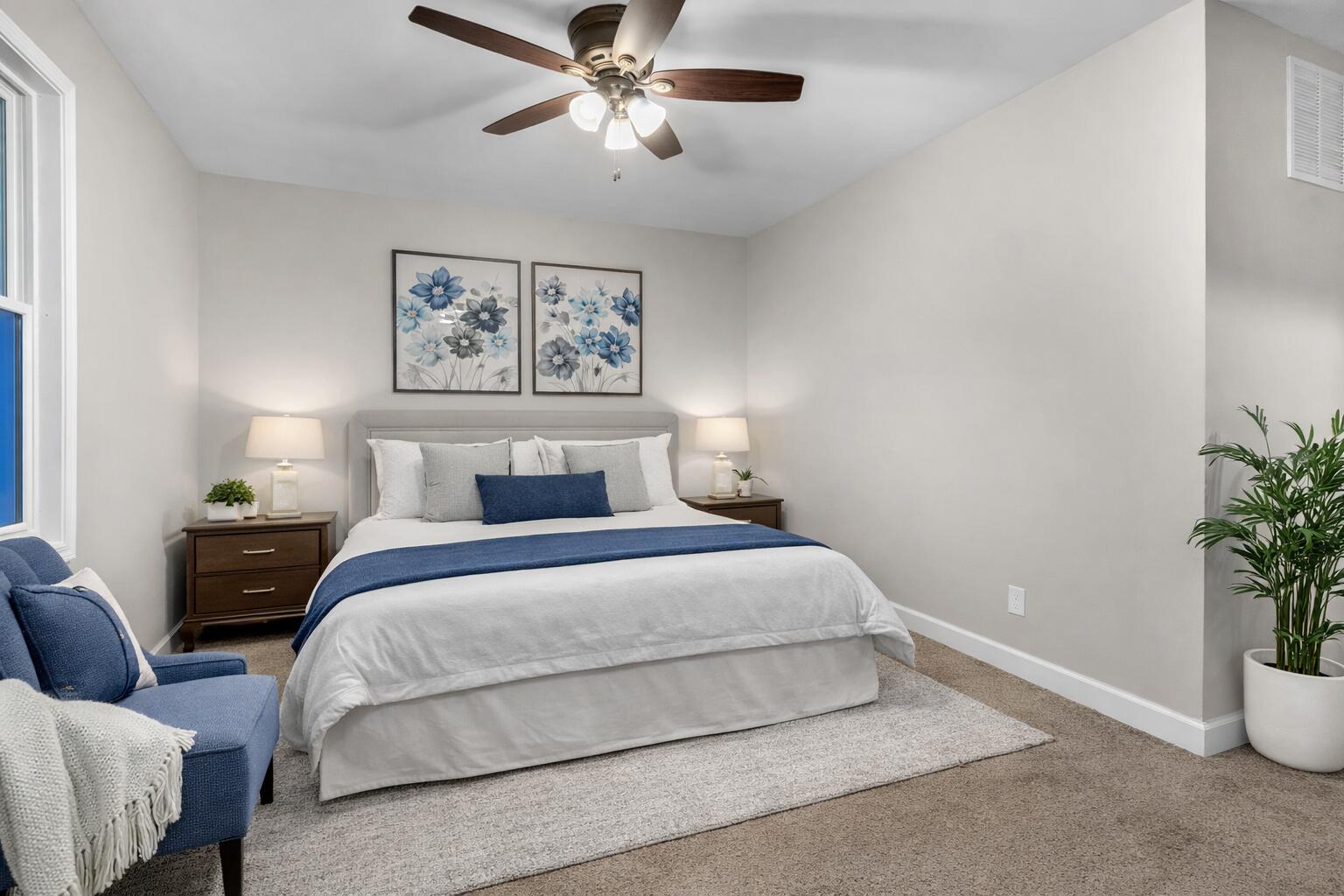 3902 North Explorer Lane Wheatfield, IN 46392 - Photo 20 of 34 a bedroom with a bed and a potted plant